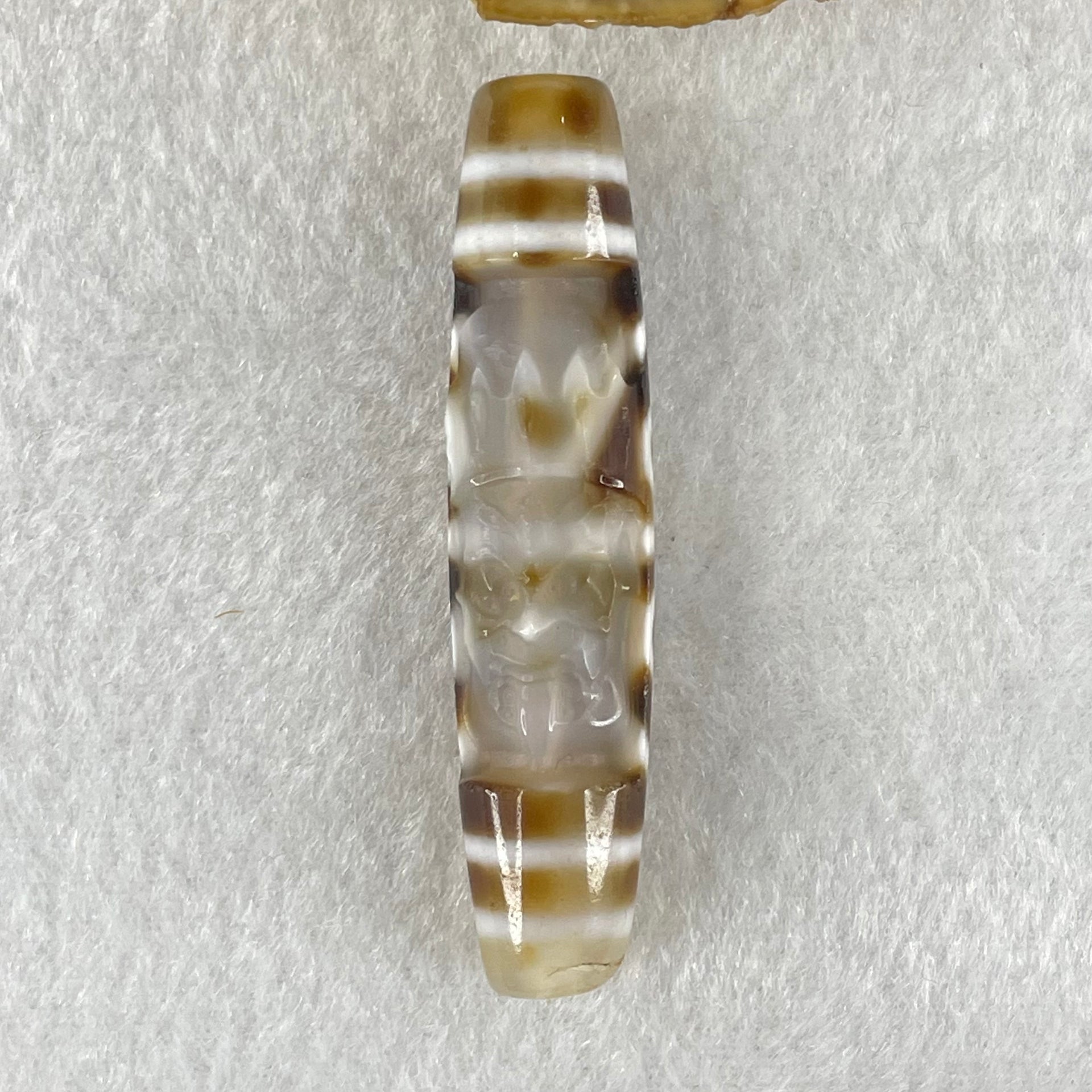 Natural Powerful Tibetan Old Oily Agate Zha Ji La Mu Female Cai Shen and 8 Eyes Dzi Bead Heavenly Master (Tian Zhu) 扎基拉姆女财神八眼天珠 13.65g 57.3 by 12.5mm - Huangs Jadeite and Jewelry Pte Ltd