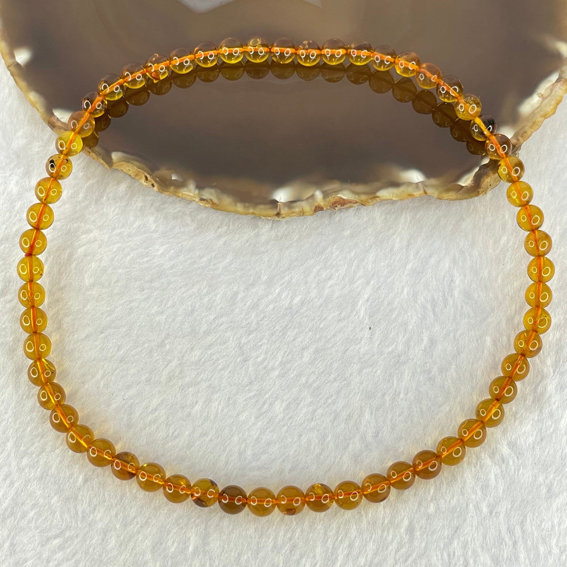 Natural Gold Yellow Amber Elastic Necklace 天然黄琥珀项链 9.24g 32cm 6.7mm 59 Beads - Huangs Jadeite and Jewelry Pte Ltd