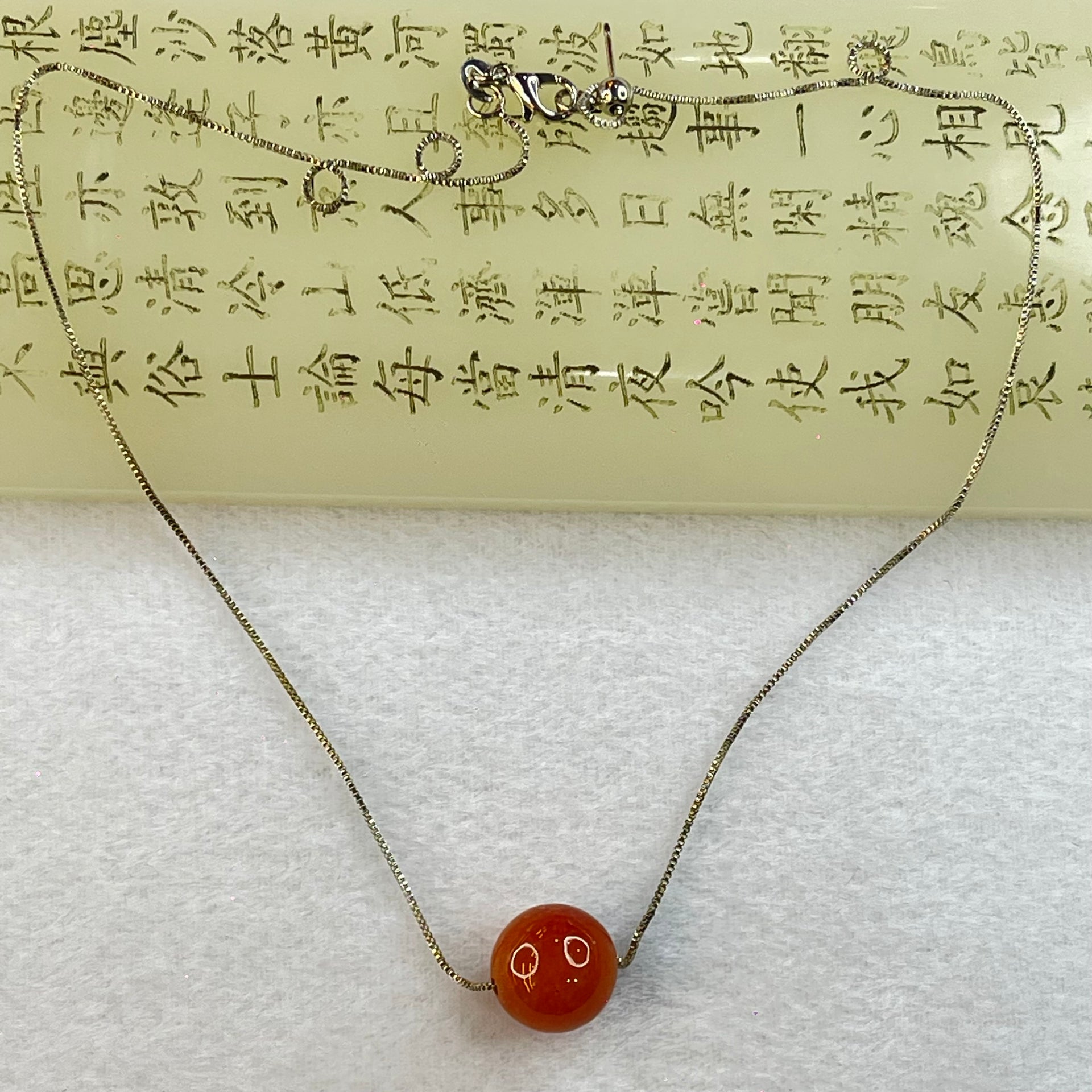 Type A Brownish Red Jadeite Bead with S925 Sliver Necklace 6.10g 13.7mm - Huangs Jadeite and Jewelry Pte Ltd