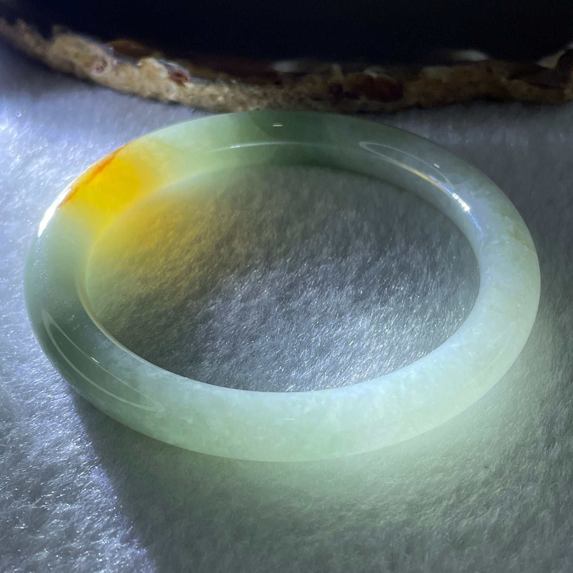 Natural Type A Light Green with Yellow Brown Patch Jadeite Bangle 38.72g Inner Diameter 56.5mm Thickness 8.7 by 8.6mm (Internal Lines) - Huangs Jadeite and Jewelry Pte Ltd