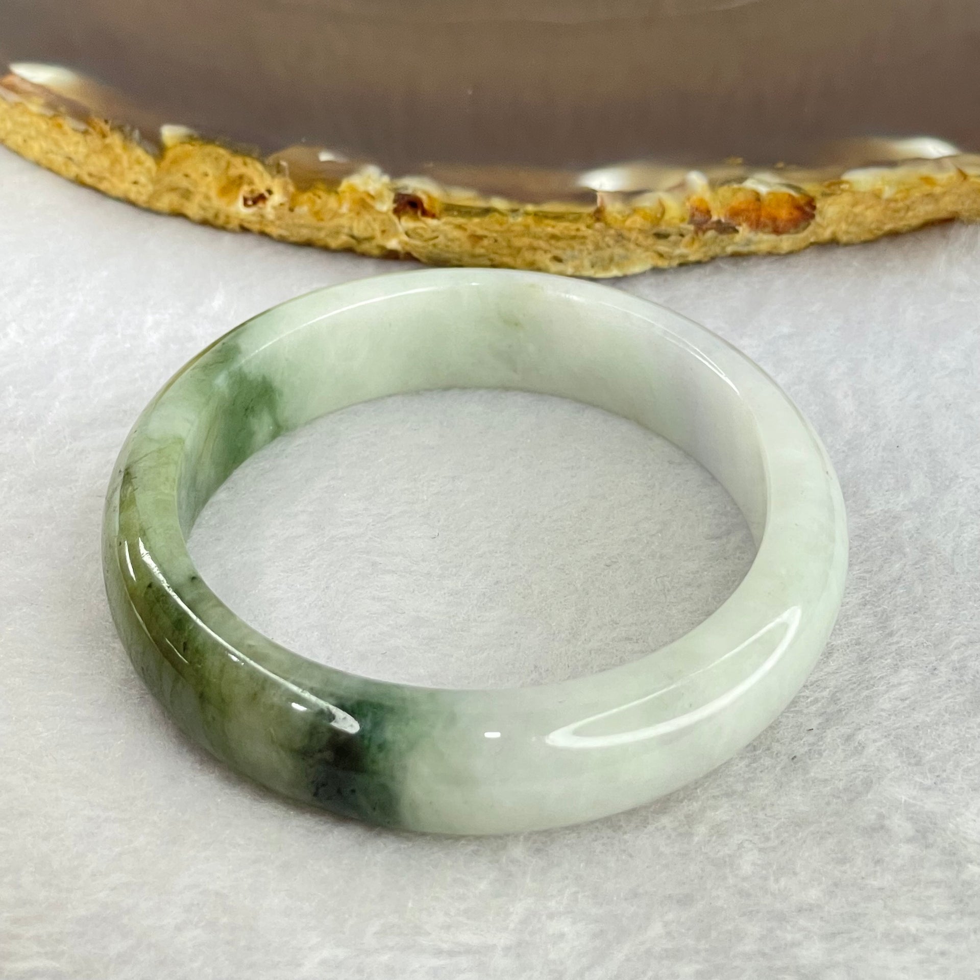 Type A Faint Lavender and Moss Green Jadeite Oval Bangle Internal Diameter 55.2mm 38.79g 11.6 by 8.7mm (Slight Fine Internal Lines) - Huangs Jadeite and Jewelry Pte Ltd