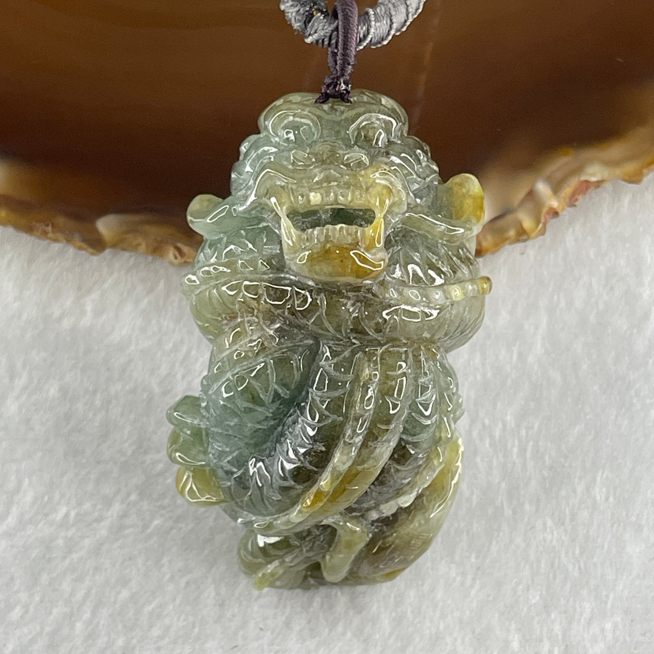Type A Green with Yellow Patches Jadeite Dragon Pendant 97.19g 57.7 by 34.2 by 34.4mm