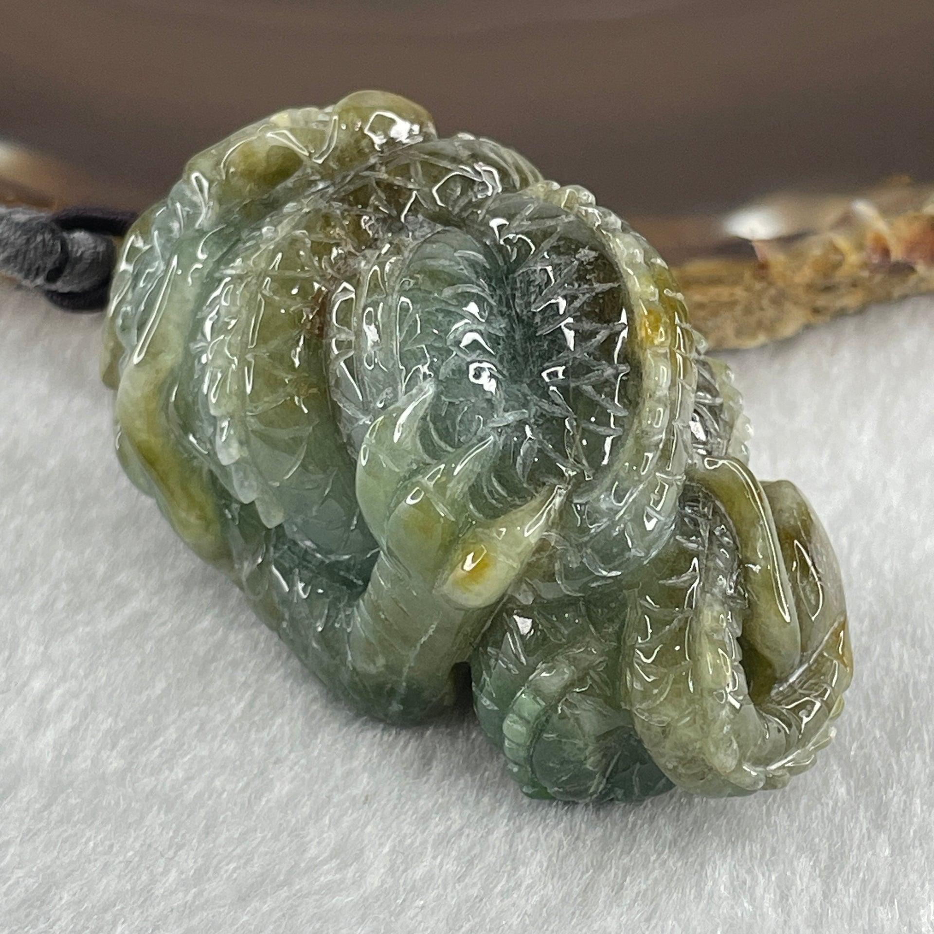 Type A Green with Yellow Patches Jadeite Dragon Pendant 97.19g 57.7 by 34.2 by 34.4mm - Huangs Jadeite and Jewelry Pte Ltd