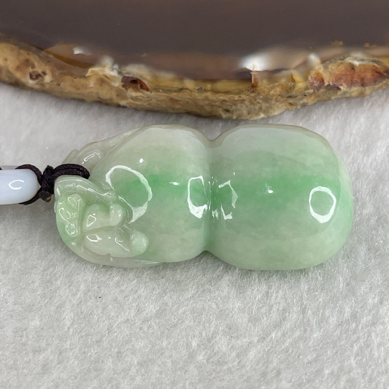 Natural Type A Faint Green with Apple Green Piao Hua Jadeite Monkey on Hulu Pendant 28.61g 41.2 by 23.3 by 14.2mm - Huangs Jadeite and Jewelry Pte Ltd
