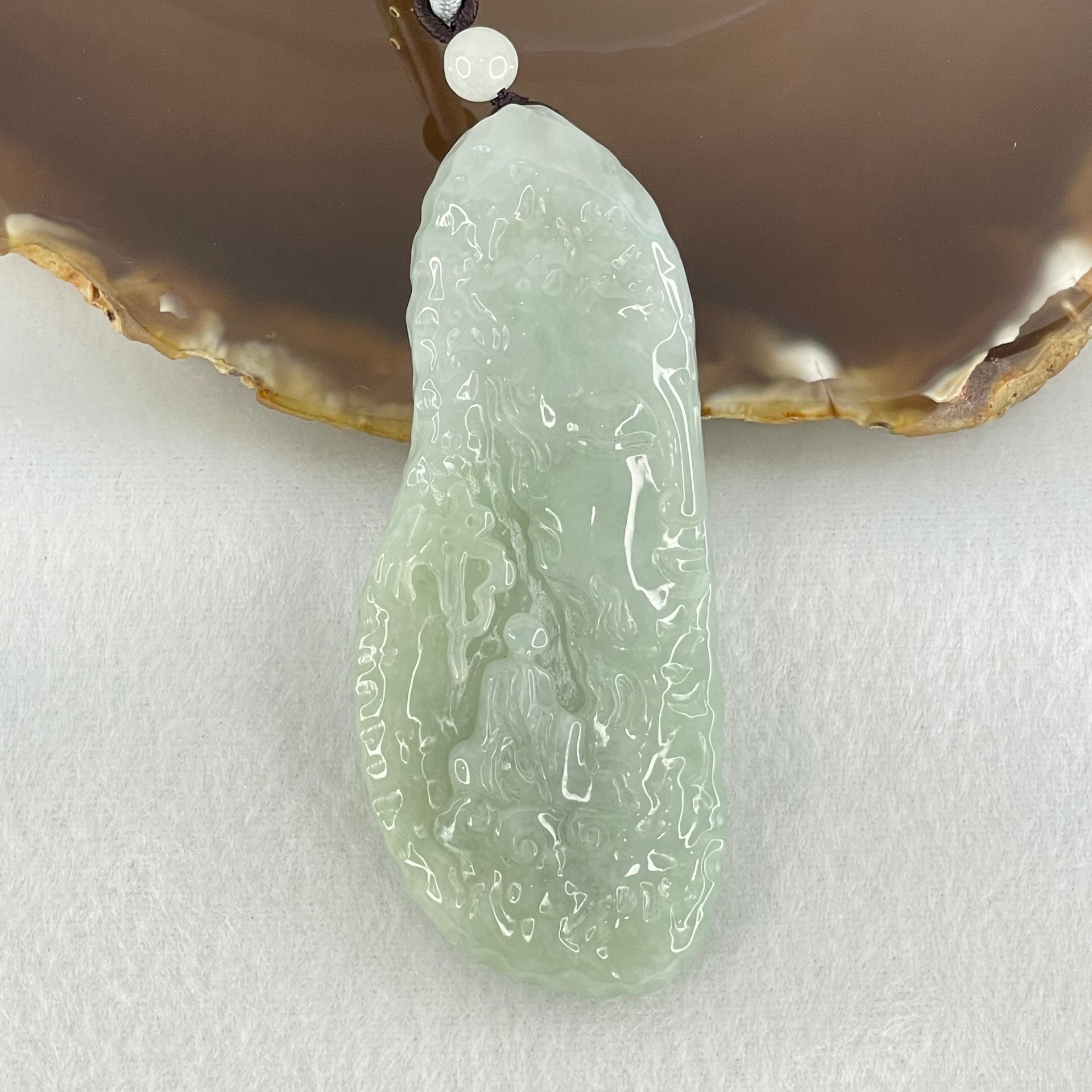 Type A Light Blueish Green Jadeite Seeking Enlightenment with Buddha Pendant 68.18g 78.6 by 32.5 by 12.5mm - Huangs Jadeite and Jewelry Pte Ltd