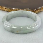 Type A Translucent Faint Blueish Green with Patches of Light Grey and Faint Lavender Jadeite Bangle Internal Diameter 56.95mm 344.09cts 69.22g 14.6 by 8.9mm With NGI Cert No 32886054 (Very Slight Internal Line) - Huangs Jadeite and Jewelry Pte Ltd
