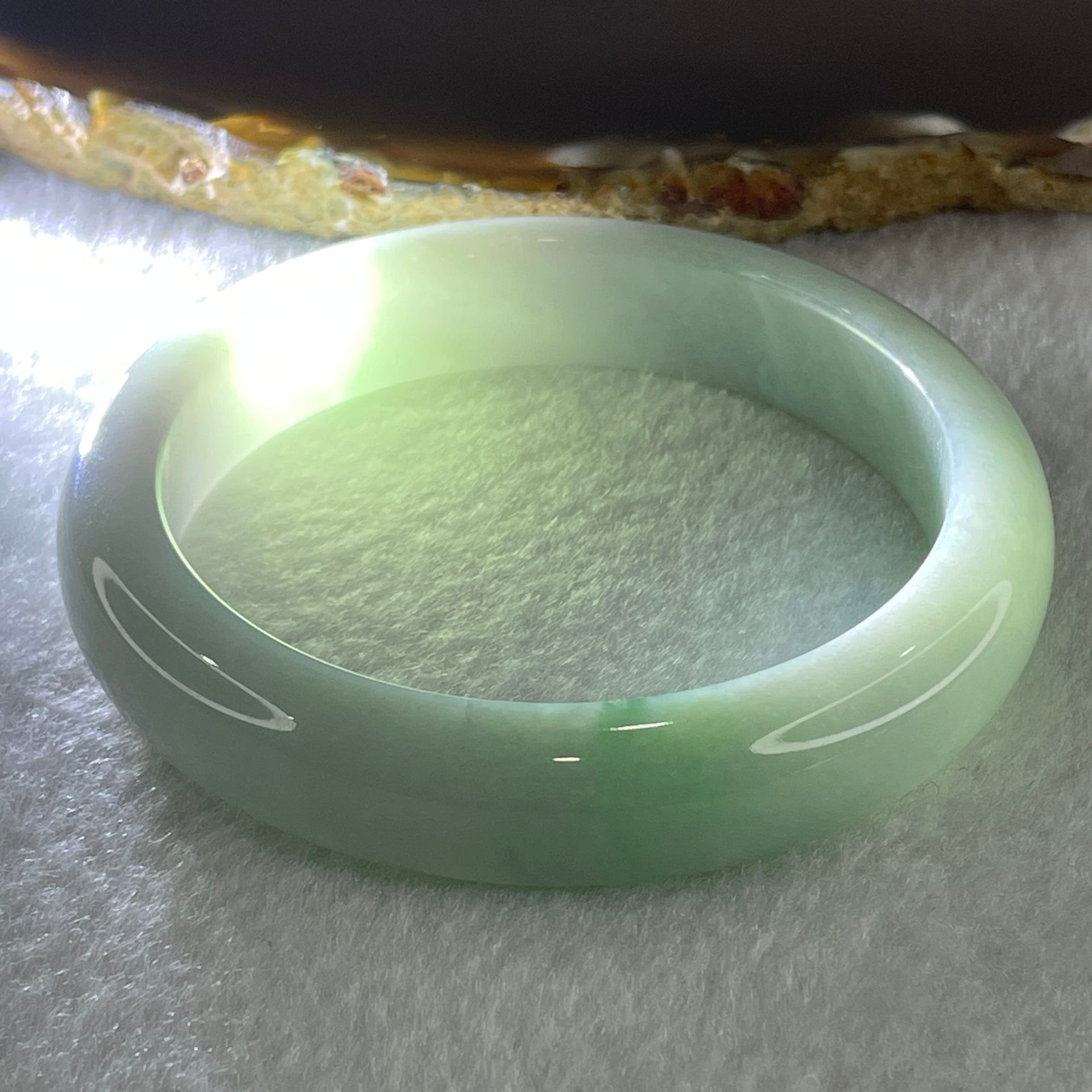 Certified Type A Natural Jelly Faint Green with Faint Lavender with Emerald Green Spot Jadeite Bangle 65.47g Inner Diameter 57.5mm 12.8 by 9.0mm (Very Very Slight Internal Line) - Huangs Jadeite and Jewelry Pte Ltd