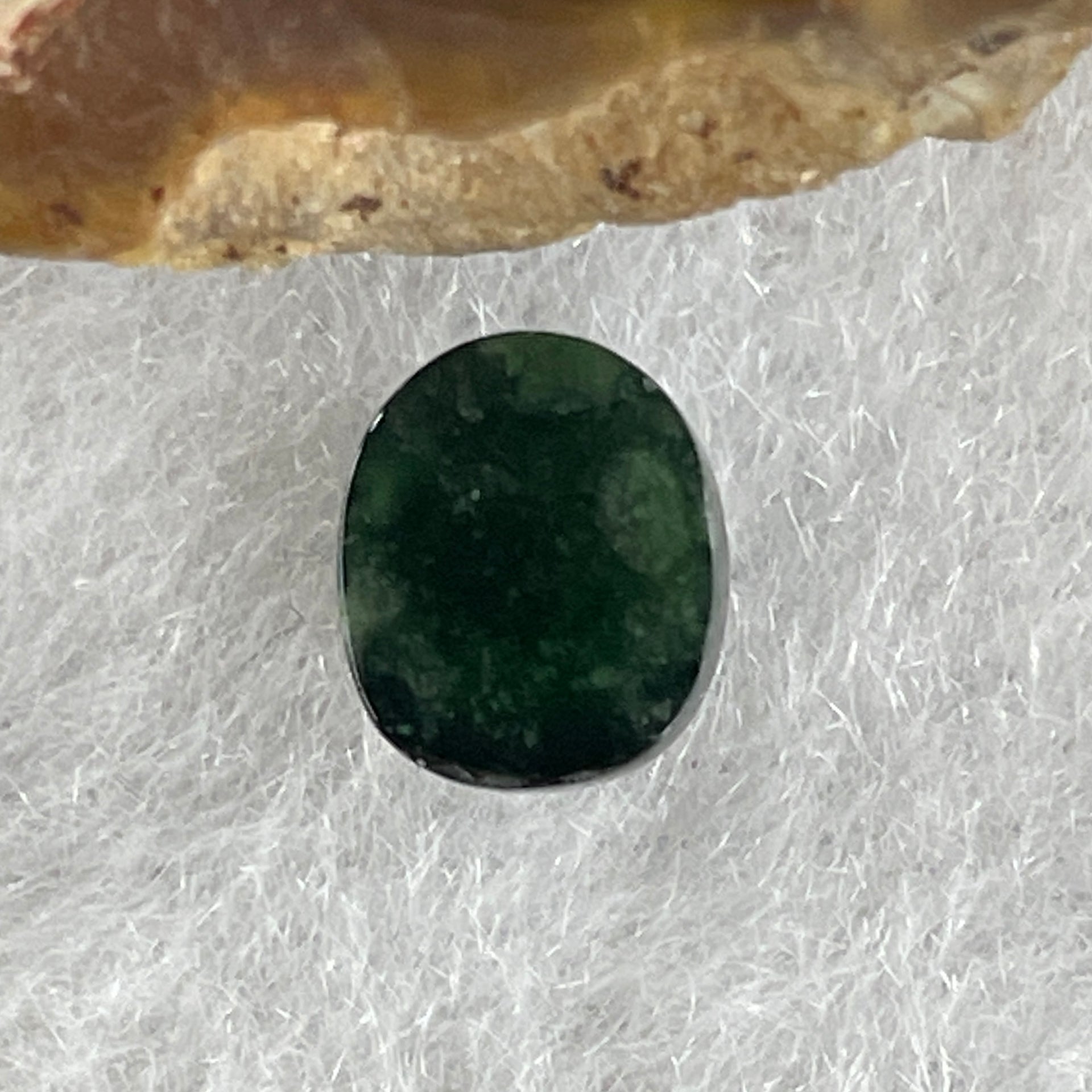 Type A Translucent Black Omphacite Jadeite Oval Cabouchon Stone For Setting 0.38g 7.3 by 6.1 by 4.0mm - Huangs Jadeite and Jewelry Pte Ltd
