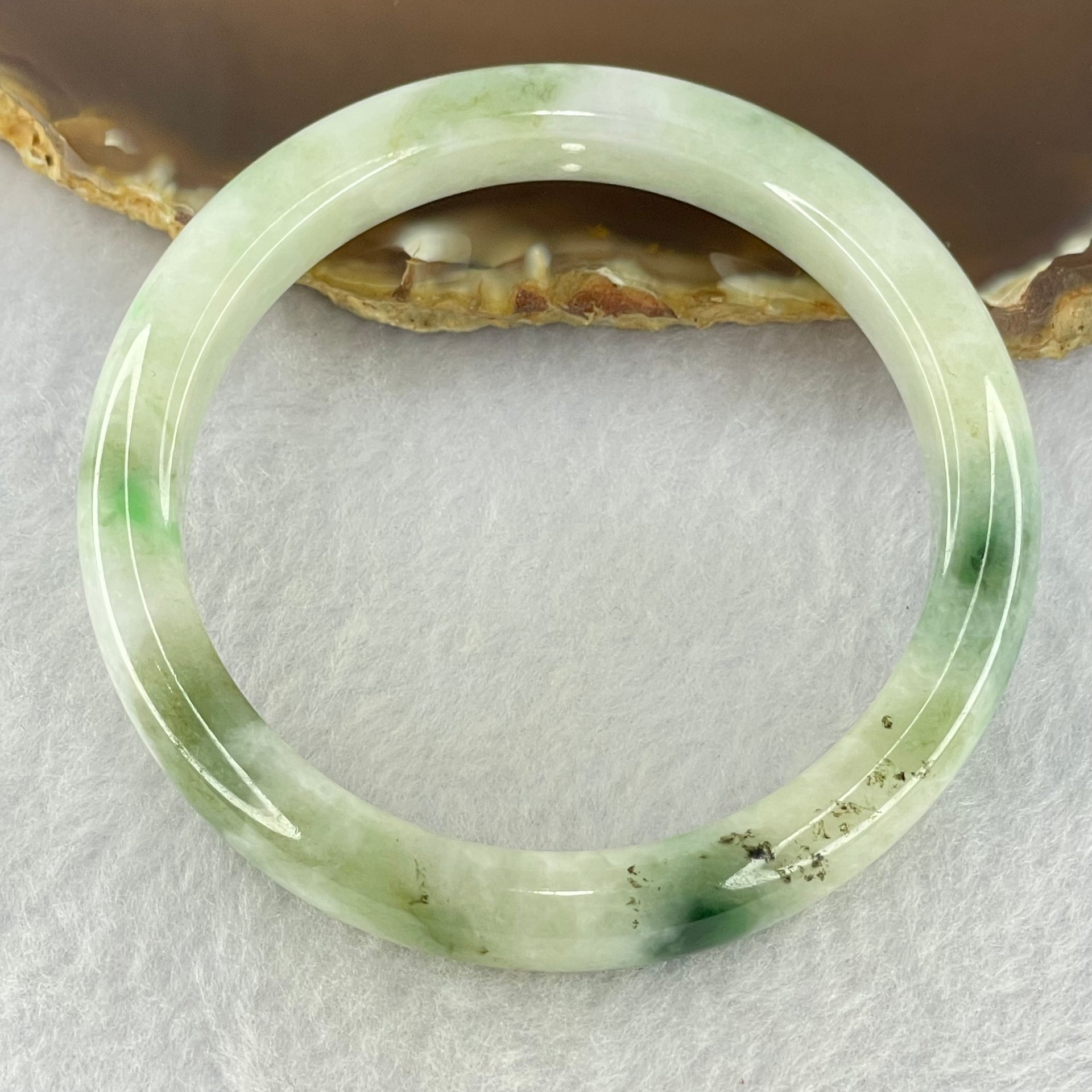 Type A Light Green with Moss Green Piao Hua Jadeite Bangle Internal Diameter 55.6mm 41.97g 10.4 by 7.6mm ( Very Slight External Rough + Internal Lines) - Huangs Jadeite and Jewelry Pte Ltd