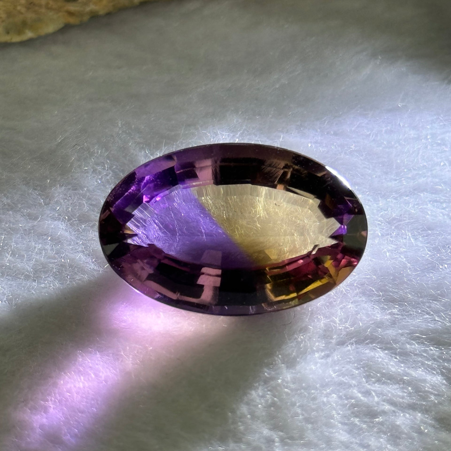 Natural Faceted Ametrine Oval Shape 24.42ct 23.2 by 15.1 by 10.9mm - Huangs Jadeite and Jewelry Pte Ltd