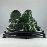 Natural Dark Green Serpentine Siting Milo Buddha with Waving Fan with Wooden Stand Display 765.0g 180.0 by 90.0 by 115.0mm - Huangs Jadeite and Jewelry Pte Ltd
