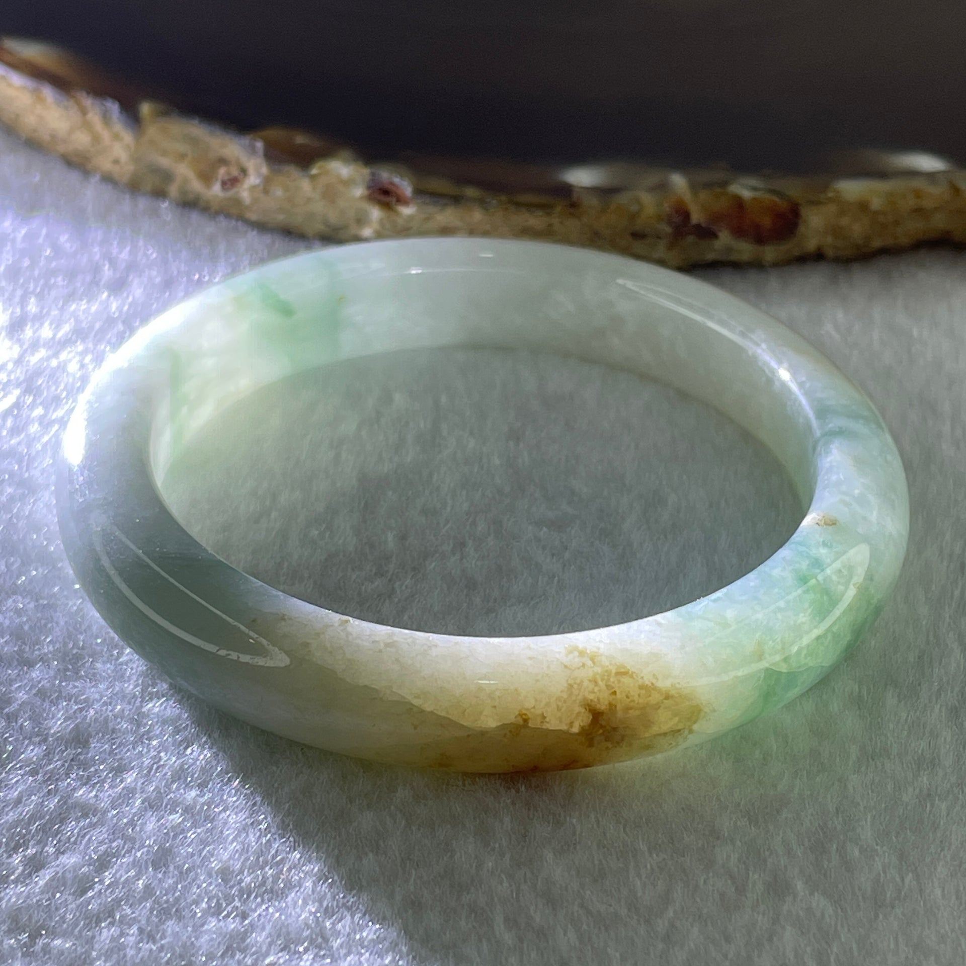 Type A Natural Jelly Light Green with Blueish Green, Red and Yellow Patches Jadeite Bangle 38.29g Inner Diameter 52.4mm 10.0 by 7.6mm (External and Internal Lines) - Huangs Jadeite and Jewelry Pte Ltd