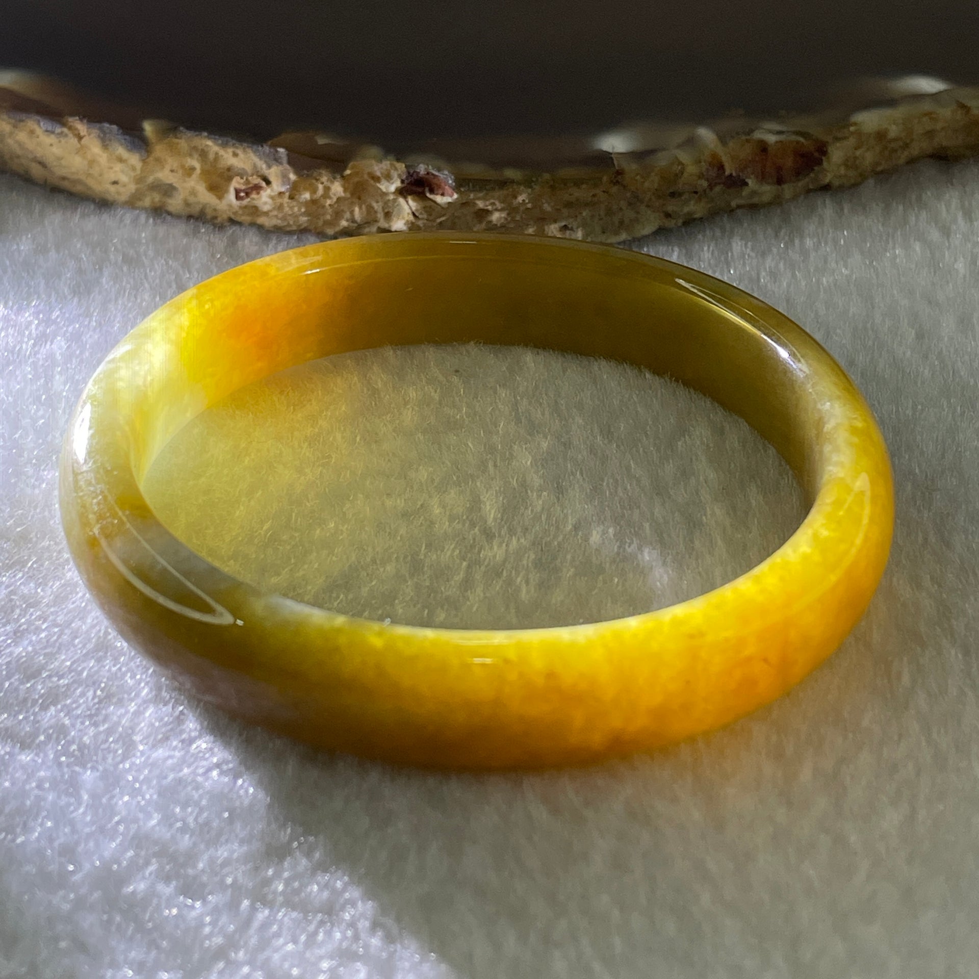 Type A Natural Intense Brownish Yellow Jadeite Oval Bangle 30.33g Inner Diameter 52.7mm 11.0 by 6.5mm (Very Slight Internal Lines) - Huangs Jadeite and Jewelry Pte Ltd