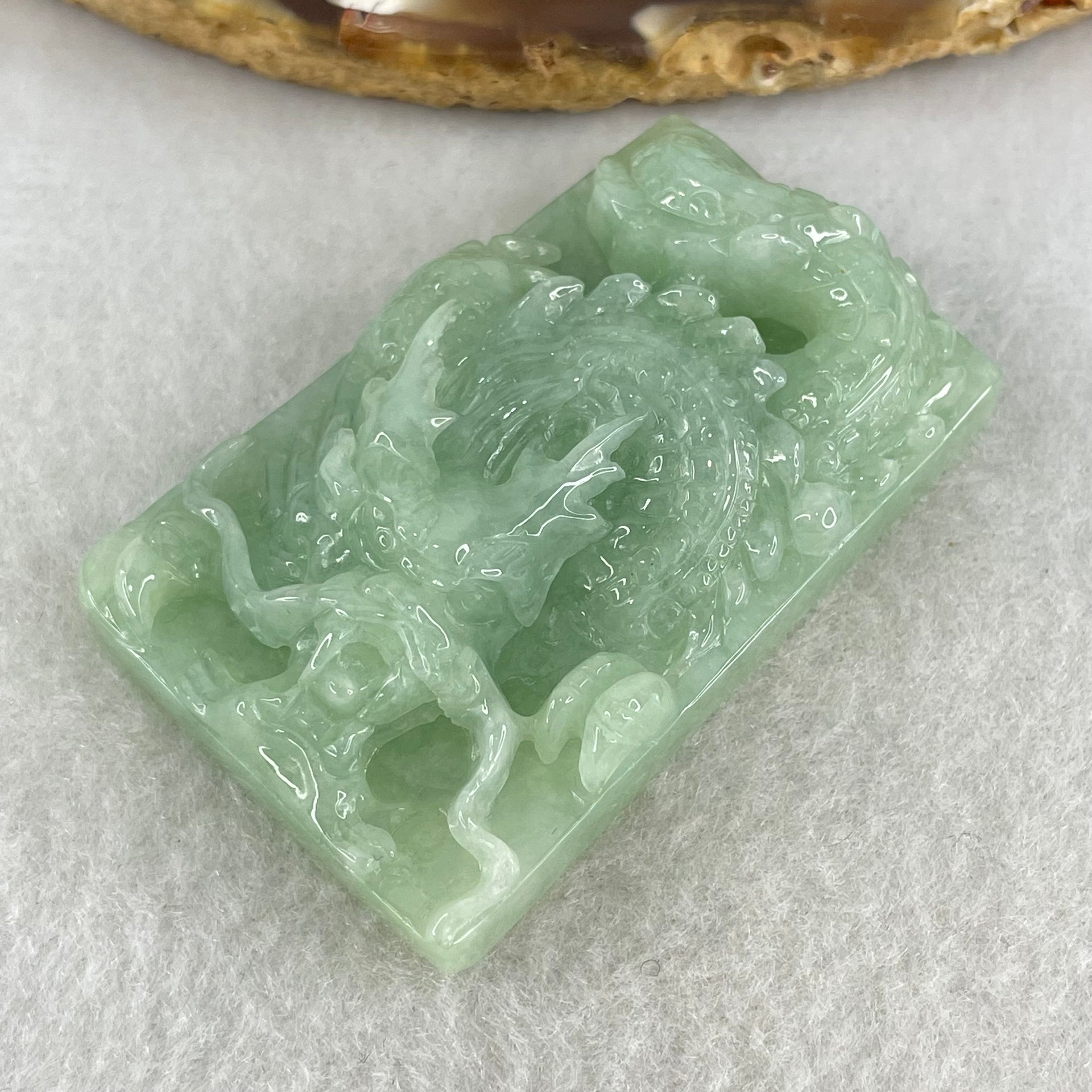 Type A Light Green Jadeite Dragon Pendant 43.35g 50.7 by 32.4 by 13.8mm - Huangs Jadeite and Jewelry Pte Ltd