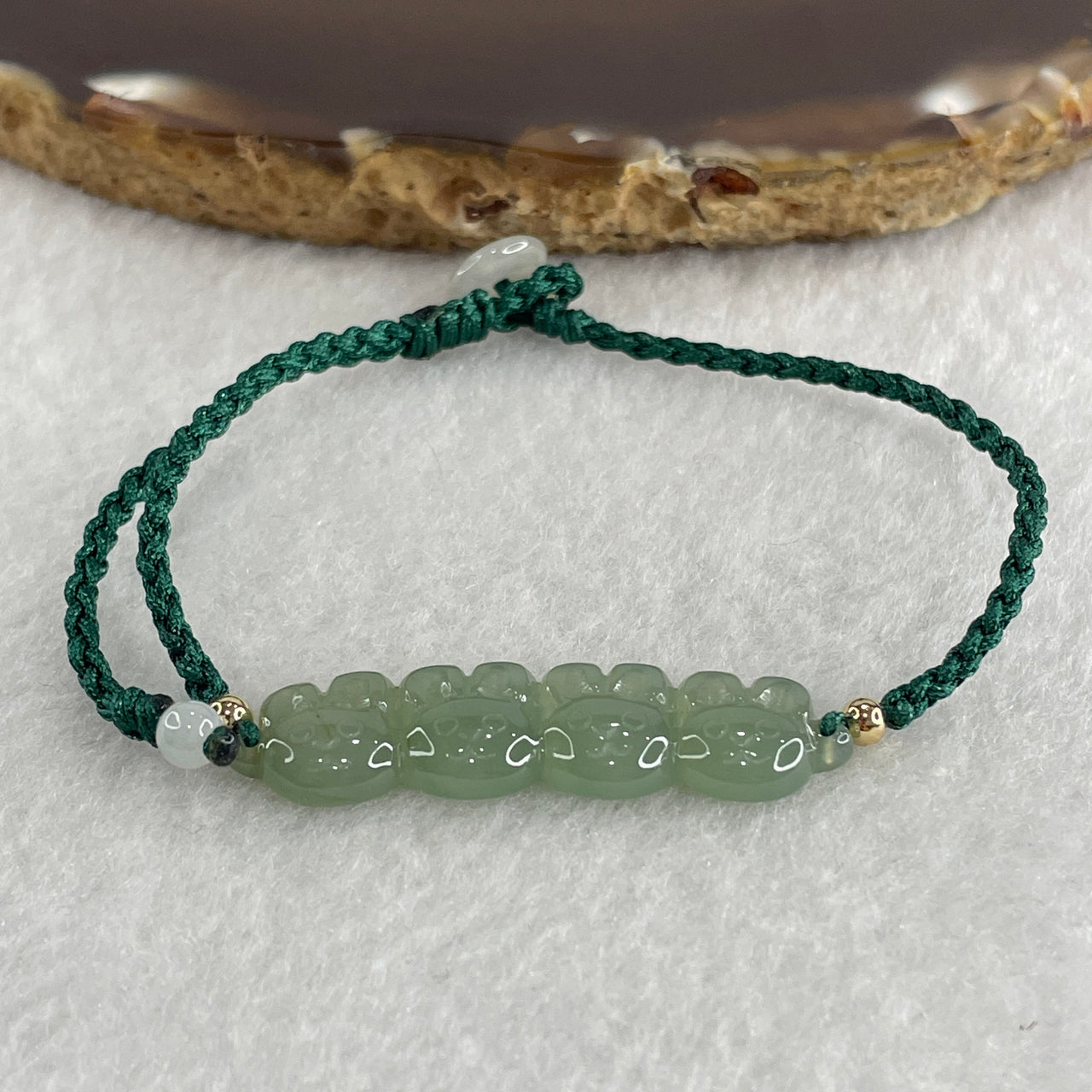 Natural Type A Semi Icy Green Jadeite 4 Rabbit on String Bracelet 3.08g 14-18cm 36.4 by 9.4 by 3.2mm