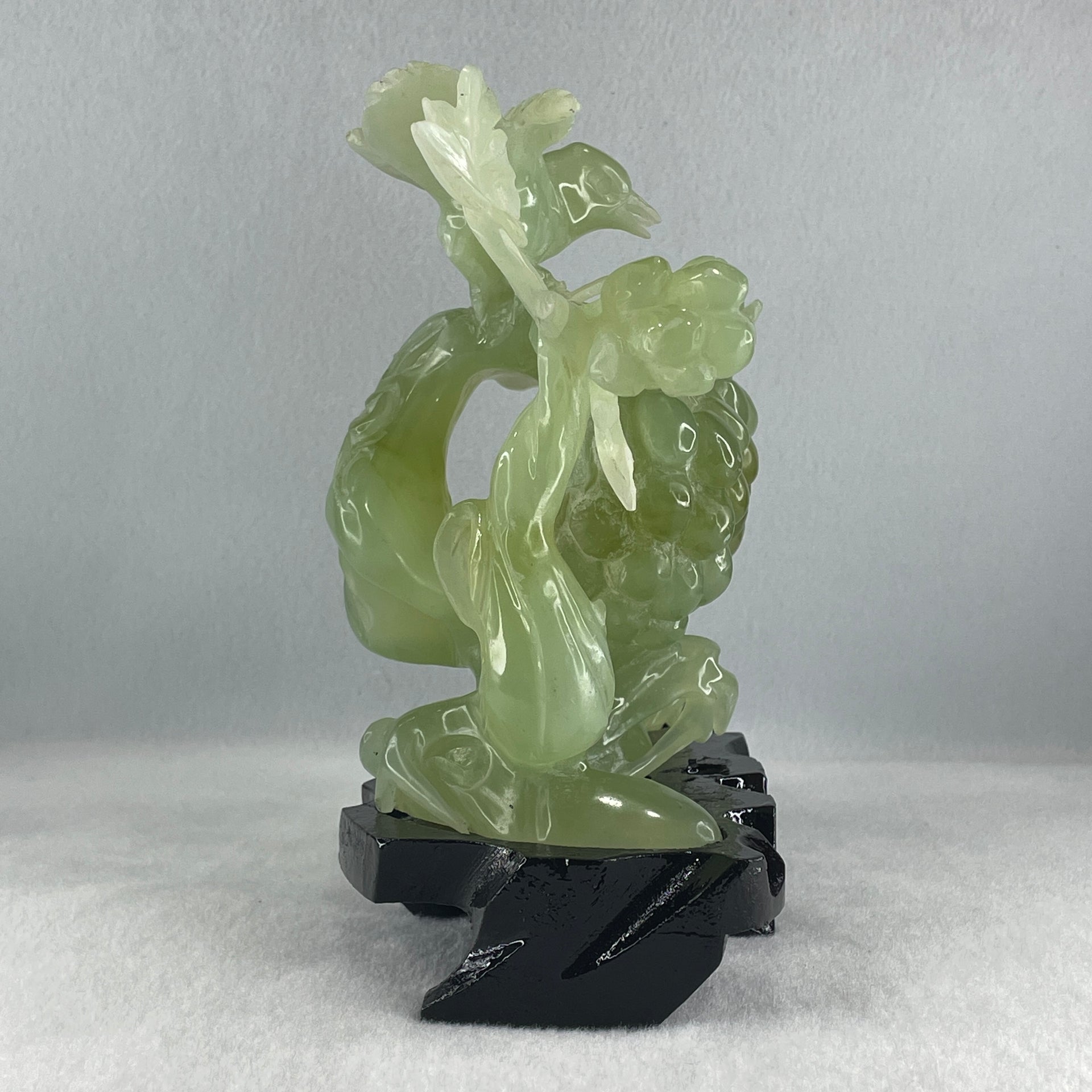 Natural Green Serpentine Magpie Bird with Cricket on Grape with Wooden Stand Display 1,042.7g L195.0 by B105.0 by H180.0 mm - Huangs Jadeite and Jewelry Pte Ltd