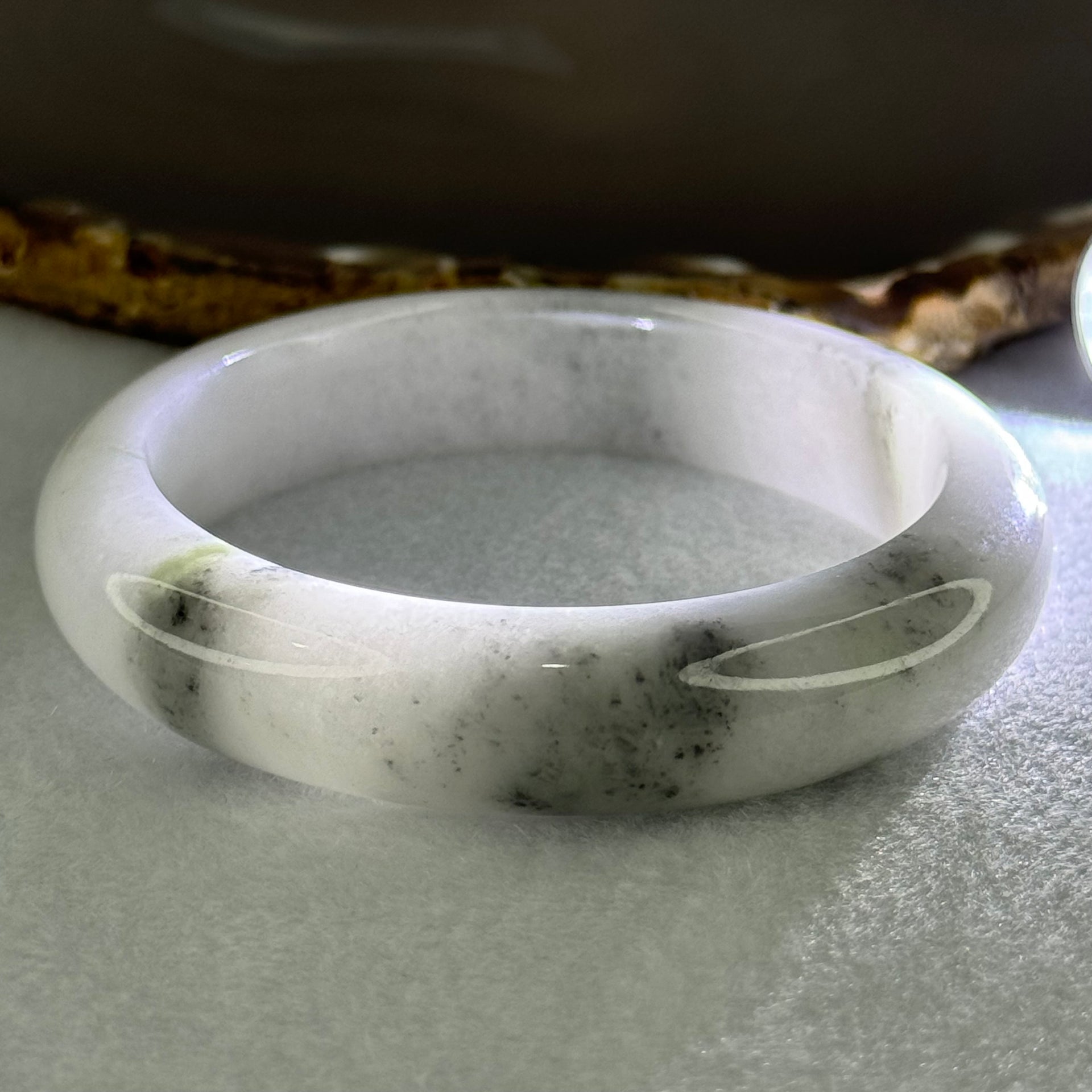 Type A Faint Lavender Green to White with Grey Wuji Patches Jadeite Bangle Internal Diameter 58.2mm 70.55g 14.0 by 9.3mm (Very Slight Internal Lines) - Huangs Jadeite and Jewelry Pte Ltd