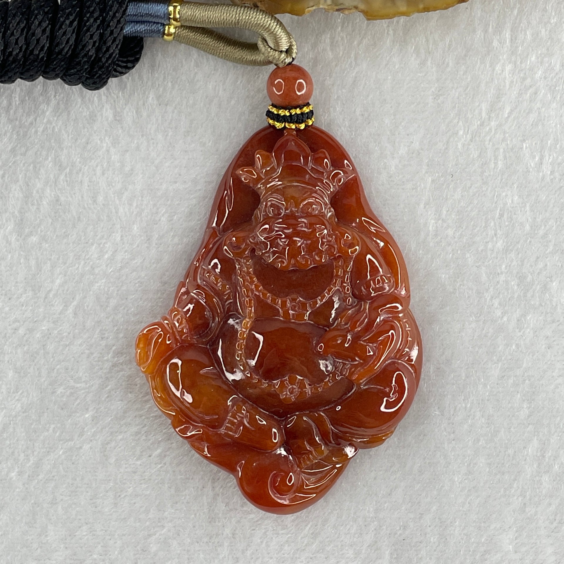 Type A Brownish Red Jadeite Jambhala Pendant 50.23g 63.6 by 45.6 by 1.5mm - Huangs Jadeite and Jewelry Pte Ltd