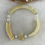 Natural Type A Light Yellowish with Light Green Jadeite Flowers with Dragon Head and Butterfly Bracelet 25.67g 7.2 by 8.4mm - Flower 40.4 by 16.5 by 6.1mm - Huangs Jadeite and Jewelry Pte Ltd