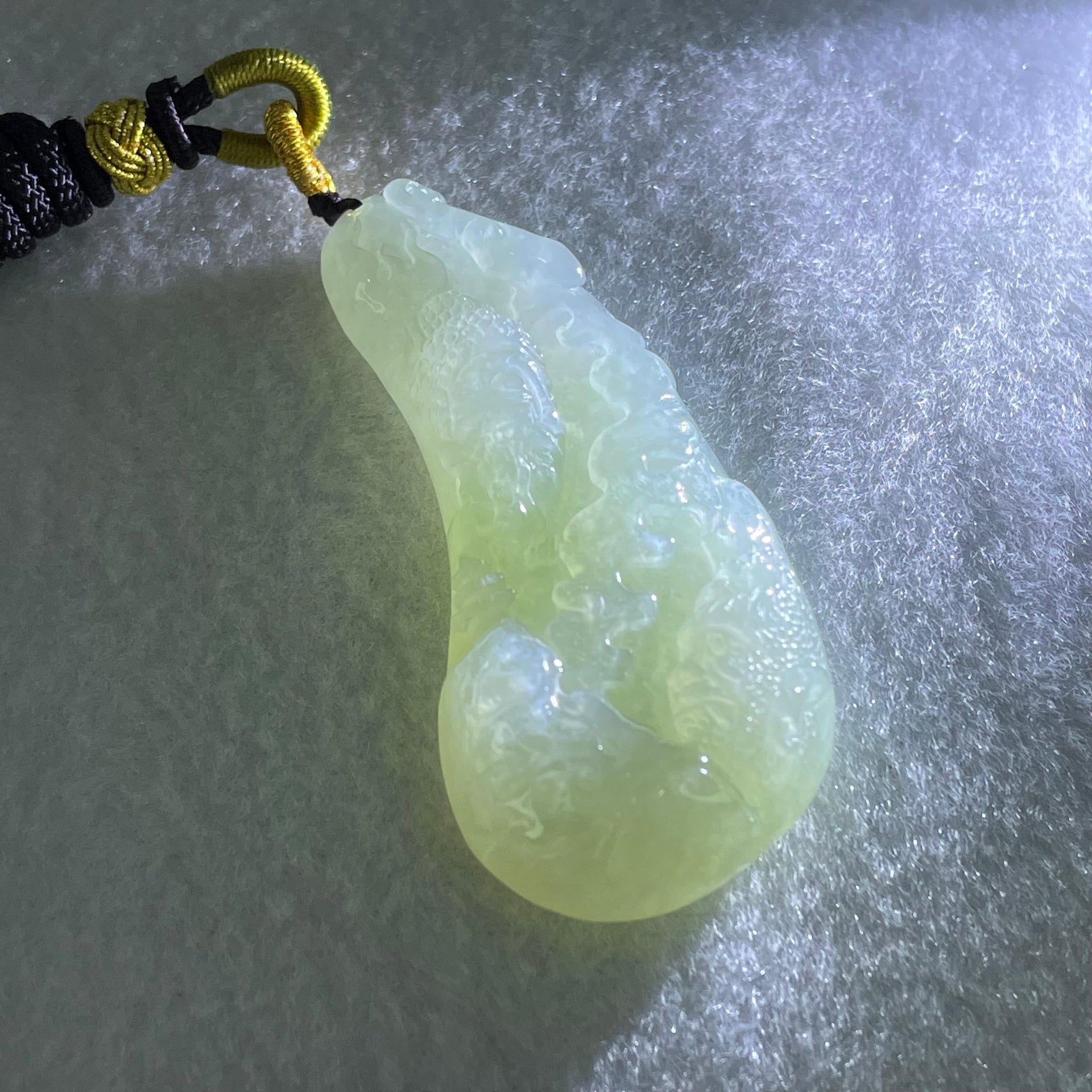 Type A Jelly Light Green Jadeite Buddha and Good Vs Evil Pendant 31.00g 61.2 by 27.0 by 11.4mm - Huangs Jadeite and Jewelry Pte Ltd