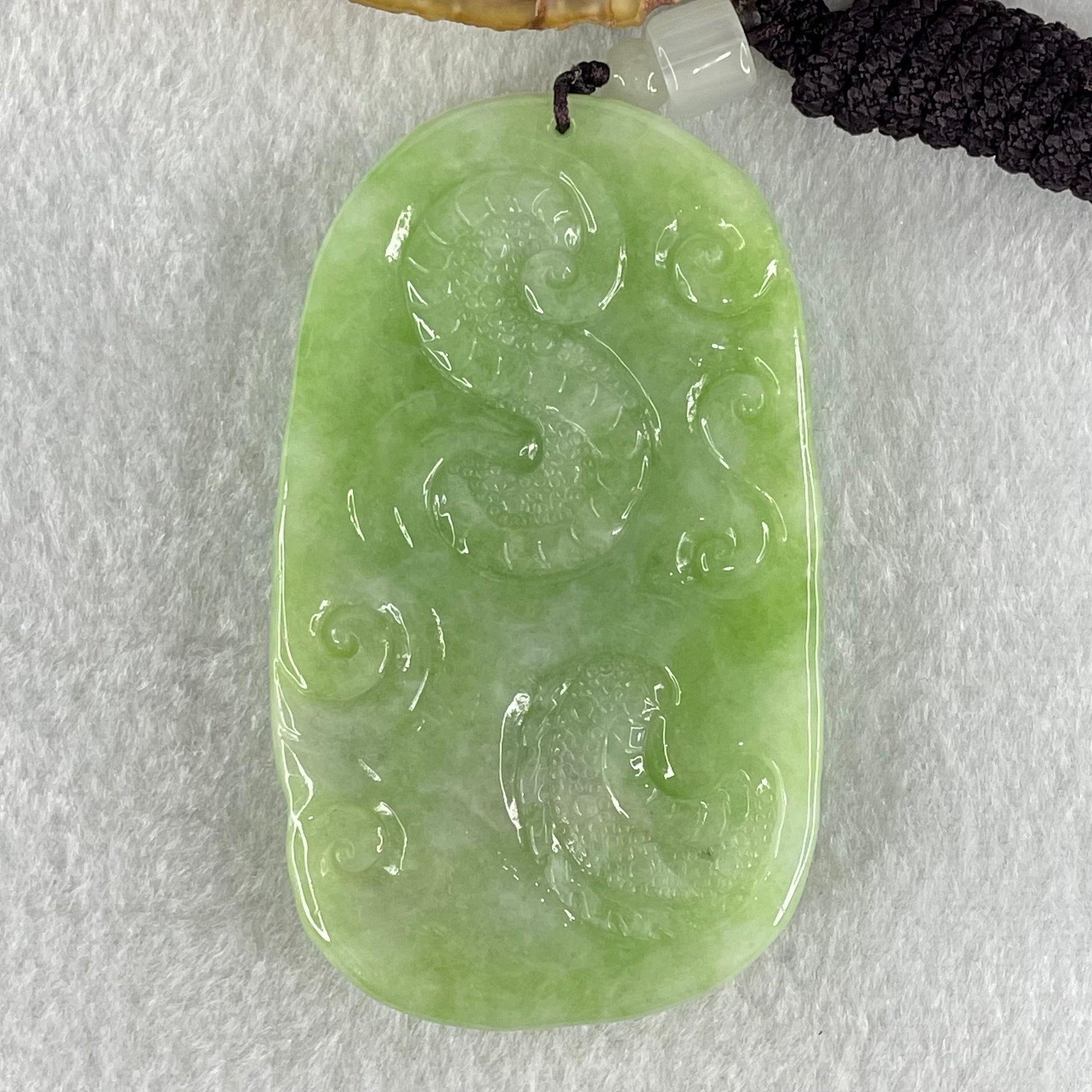 Type A Apple Green Jadeite Double Sided Fire Dragon Pendant 80.29g 75.3 by 44.4 by 13.2mm - Huangs Jadeite and Jewelry Pte Ltd