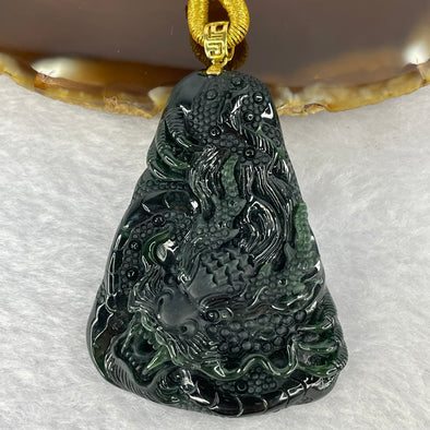 Rare High End Type A Fully Translucent Black Omphasite Jadeite Dragon (Shine Light is Dark Blueish Green) 罕见高端 A 货半透明黑色绿辉石翡翠龙  31.72g (Including String and 18K Hold Clasp) 53.75 by 40.40 by 9.65g with NGI Cert No. 82823872 - Huangs Jadeite and Jewelry Pte Ltd