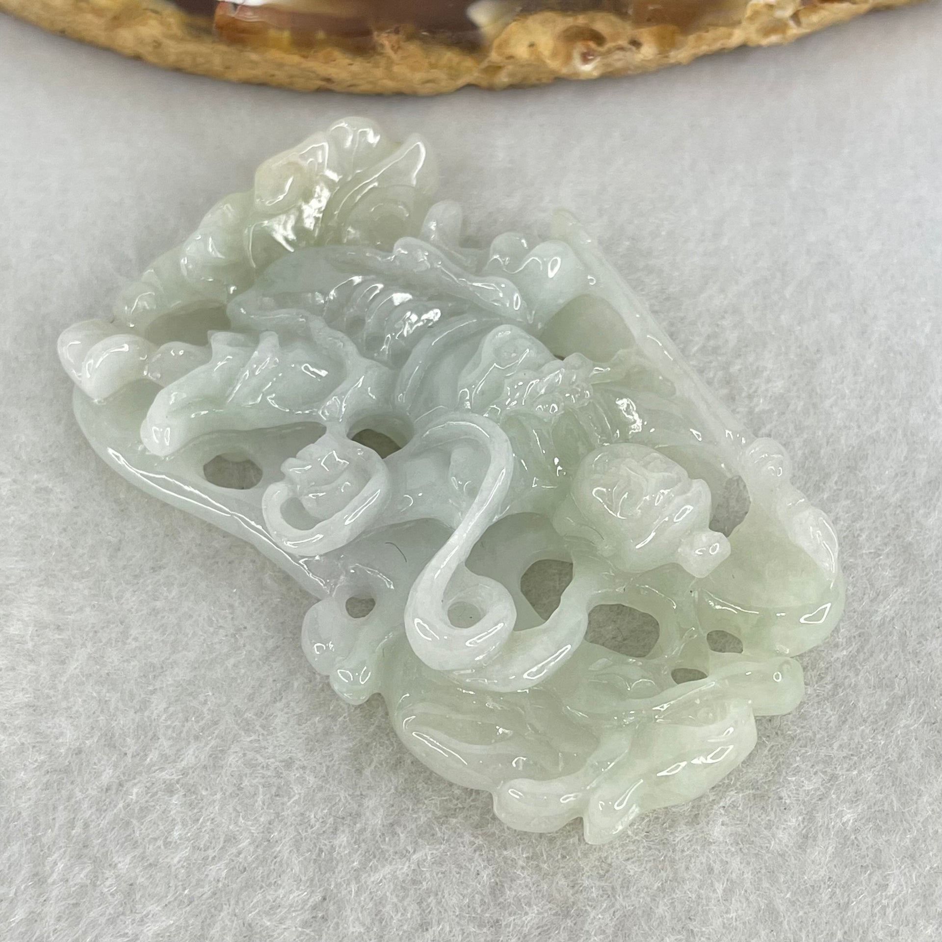 Type A Light Green and Lavender Jadeite Nezha with Dragon Pendant 25.06g 54.8 by 37.4 by 10.5mm - Huangs Jadeite and Jewelry Pte Ltd