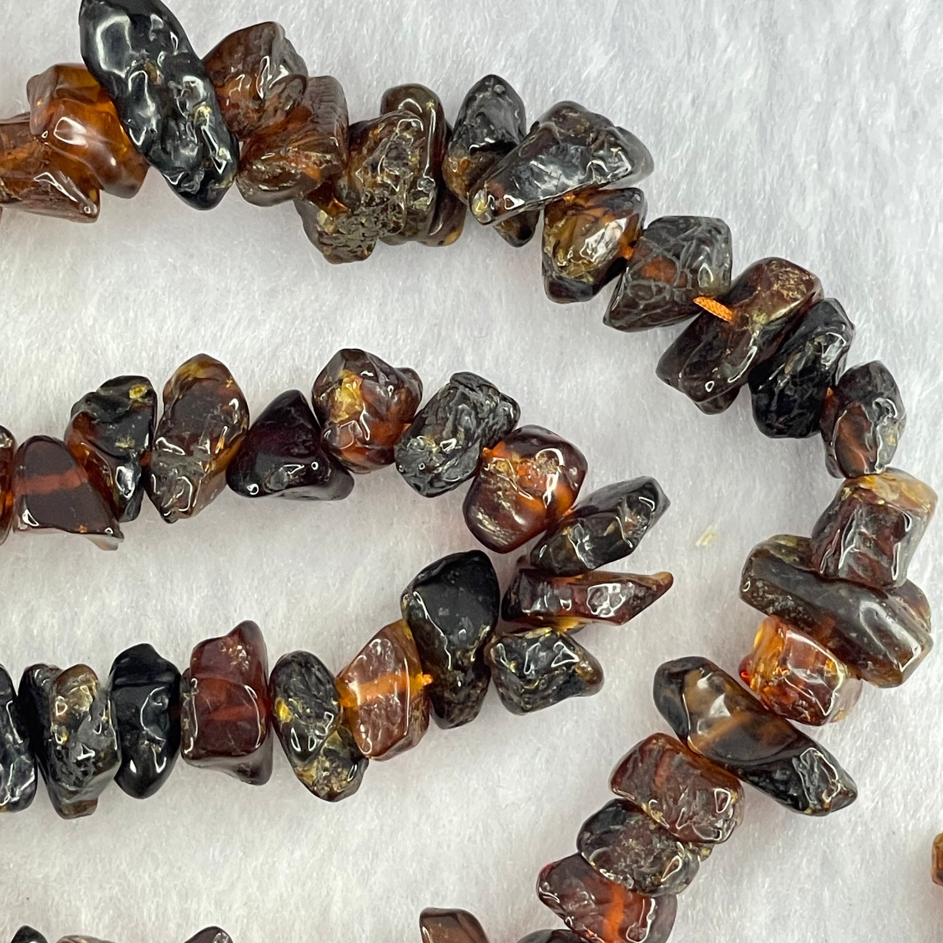 Natural Cognac Amber Beads Irregular Bracelet 34.60g 70cm 14.1 by 8.5 by 5.9mm to 7.8 by 7.1 by 4.9mm 139 Beads - Huangs Jadeite and Jewelry Pte Ltd