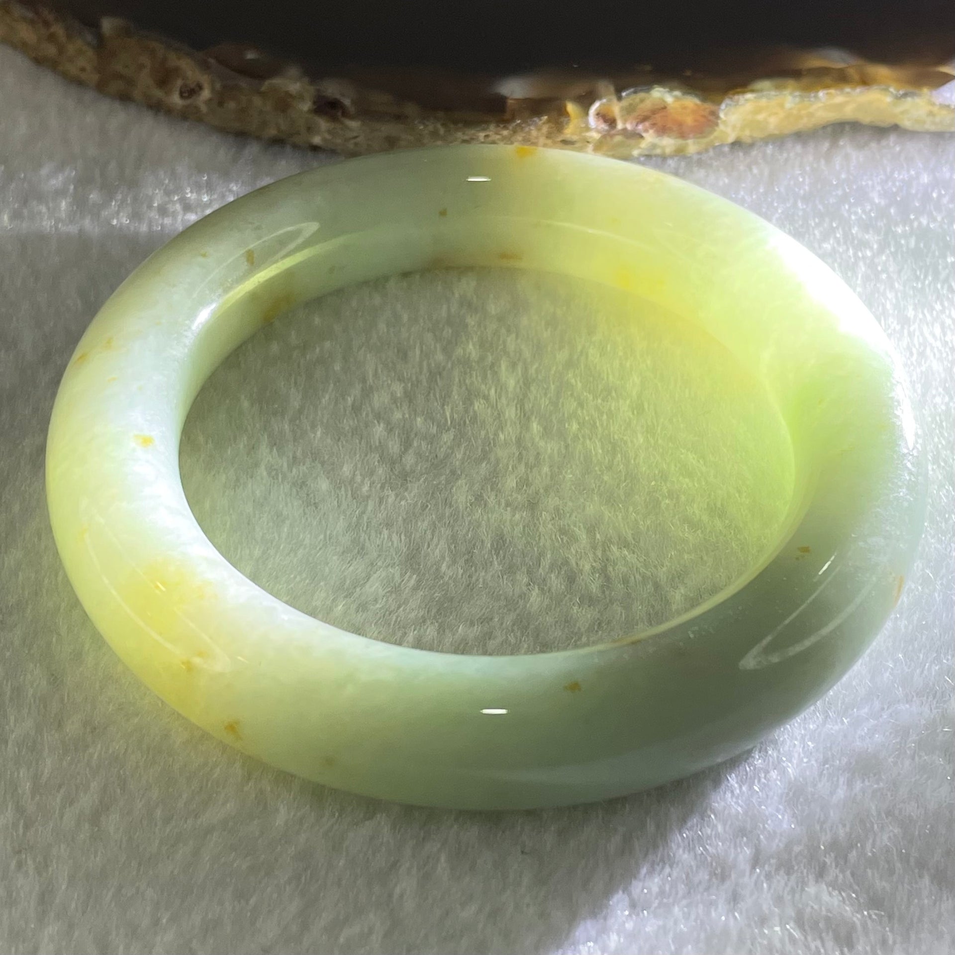 Type A Light Apple Green with Brownish Red Patches Jadeite Bangle 69.71g Internal Diameter 52.8mm 12.4 by 11.0mm (Close to Perfect) - Huangs Jadeite and Jewelry Pte Ltd