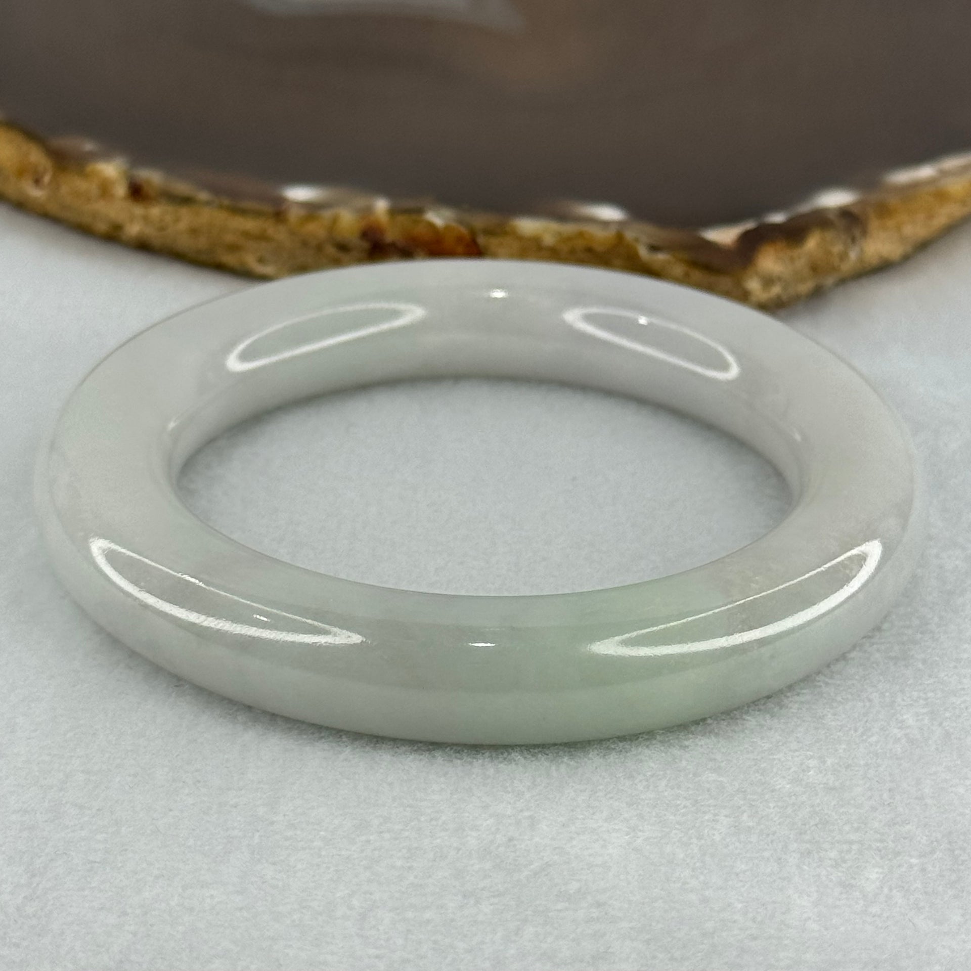 Type A Translucent Faint Blueish Green with Faint Lavender Jadeite Bangle Internal Diameter 56.79mm 437.29cts 87.85g 12.0 by 13.0mm With NGI Cert 32886087 (Close to Perfect) - Huangs Jadeite and Jewelry Pte Ltd