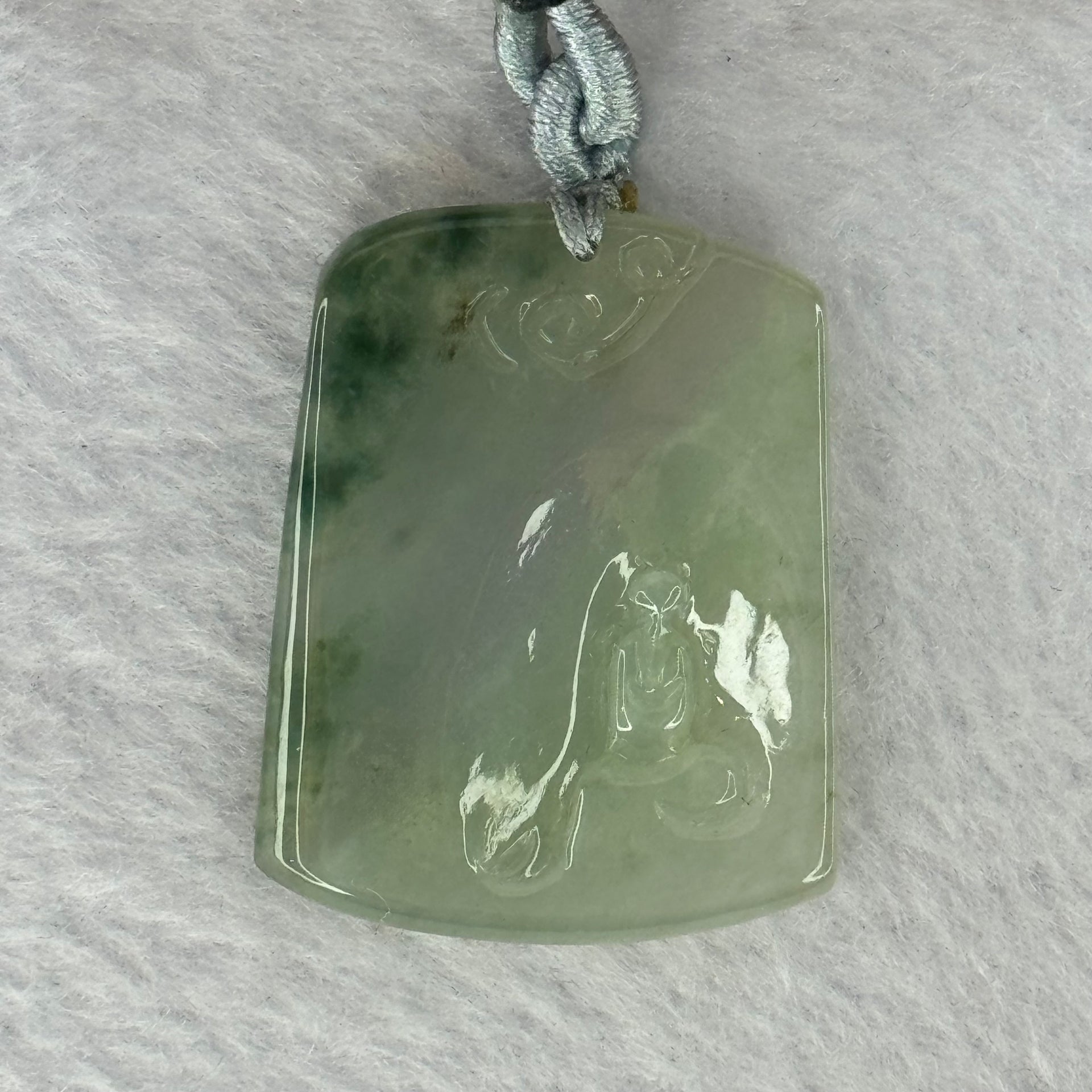 Type A Semi Icy Green Piao Hua Jadeite Shan Shui with Benefactor Gui Ren Pendent 13.79g 34.8 by 27.7 by 4.9mm - Huangs Jadeite and Jewelry Pte Ltd