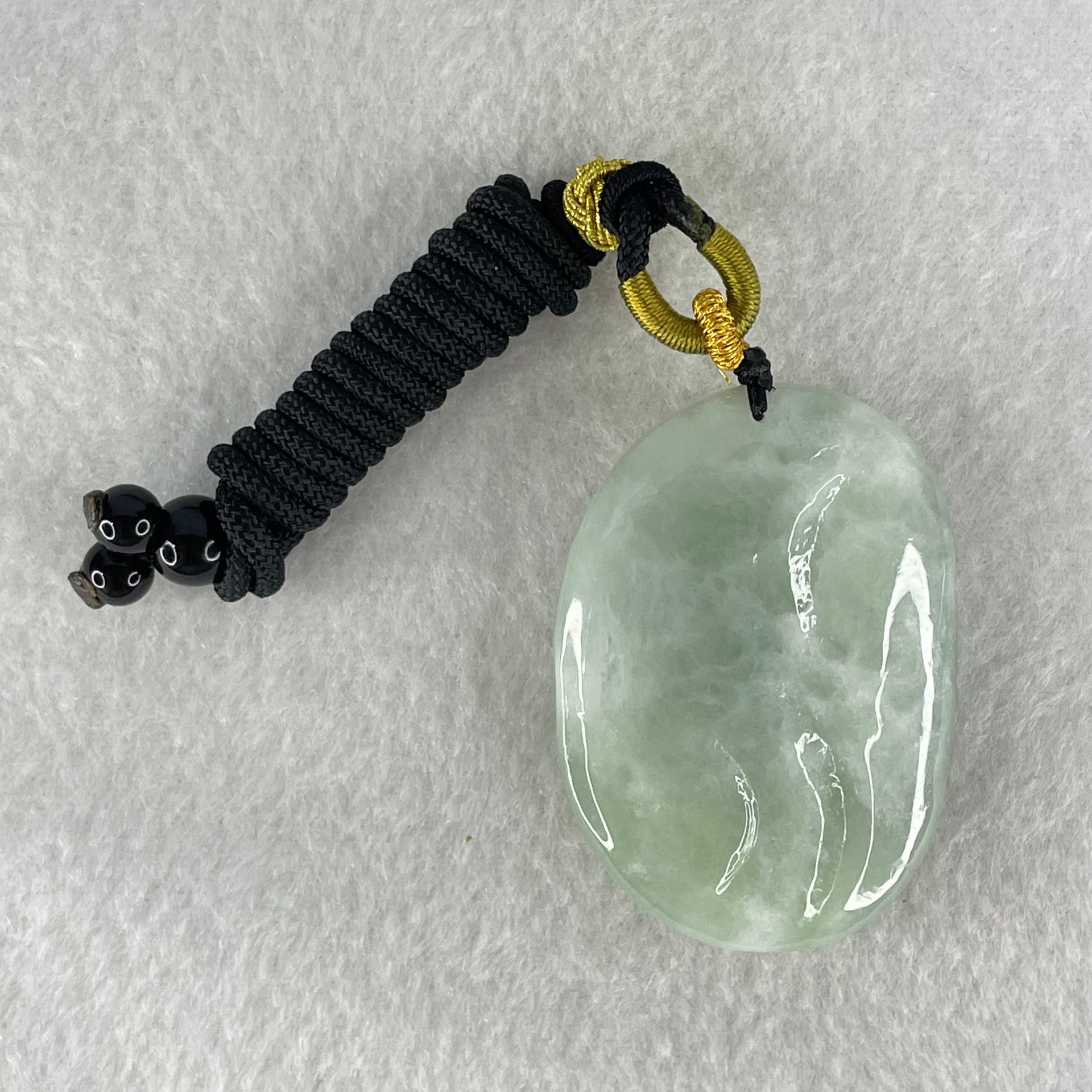 Type A Light Green with Dark Green Spot Jadeite Milo Buddha Pendant 37.98g 48.2 by 34.5 by 12.6mm - Huangs Jadeite and Jewelry Pte Ltd