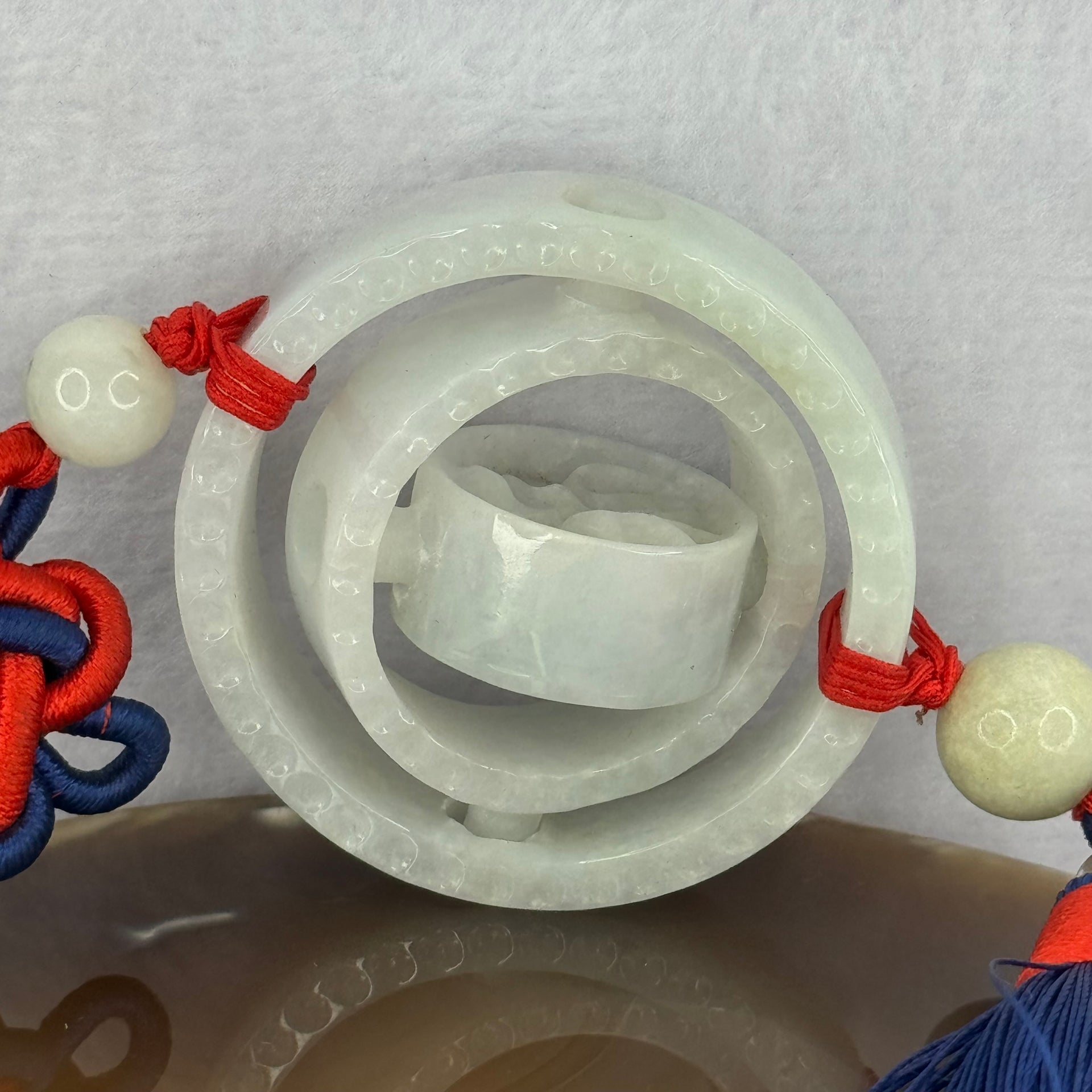 Type A Green Jadeite 3 Tiers Movable Ping An Kou Donut Display 54.49g 55.3 by 13.0mm - Huangs Jadeite and Jewelry Pte Ltd