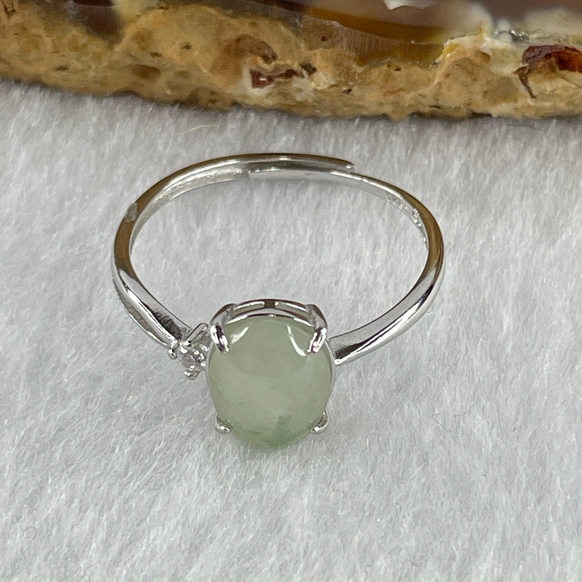 Natural Type A Semi Icy Faint Green Jadeite Oval Shape Cabouchon in S925 Silver Ring (Adjustable Size) 1.18g 8.8 by 6.4 by 3.0mm - Huangs Jadeite and Jewelry Pte Ltd