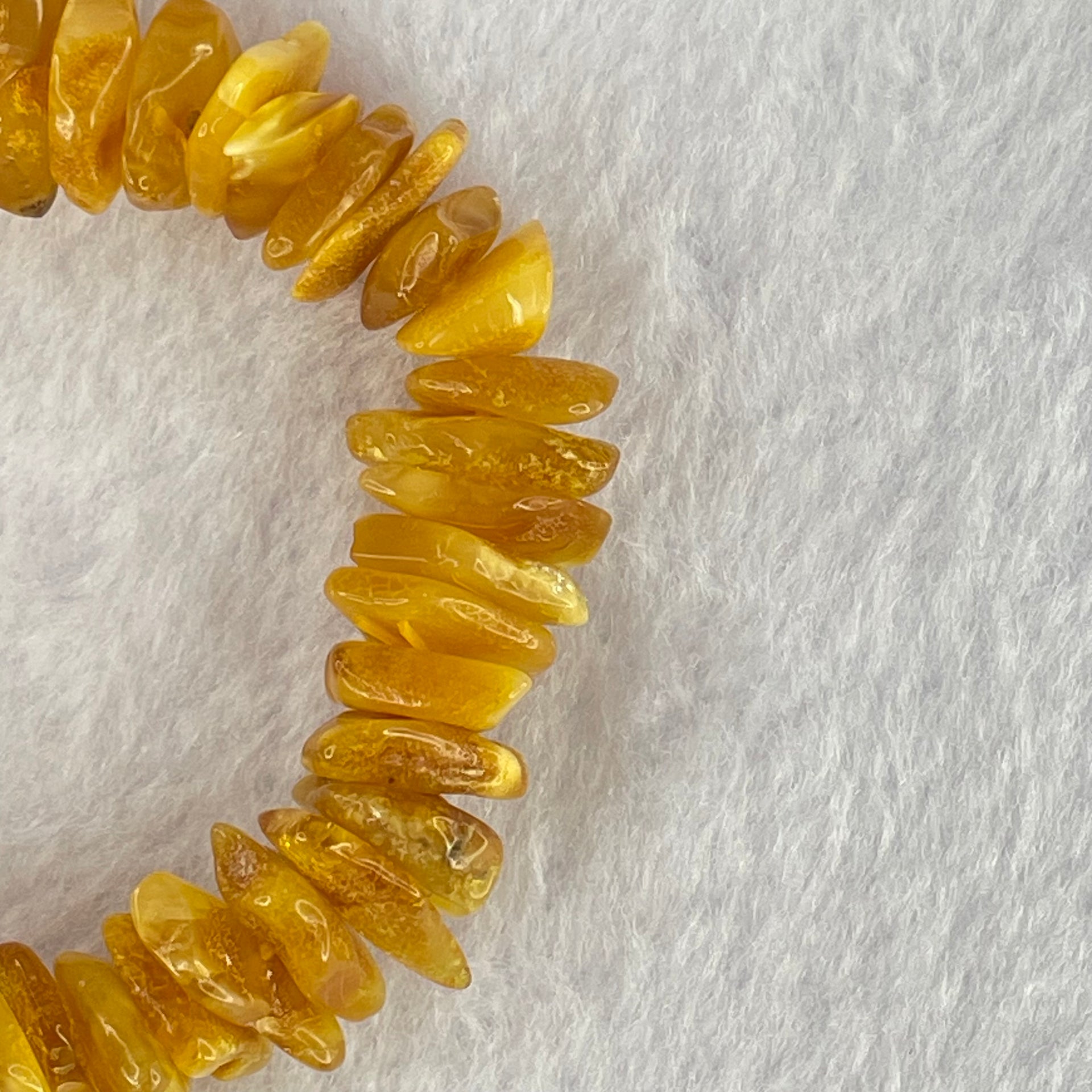 Natural Beeswax Raw Stone Irregular Beads Bracelet 天然蜜蜂蜡原石手链 17.97g 17cm 12.5 by 9.2 by 5.3mm 12.9 by 9.3 by 4.5mm 55pcs - Huangs Jadeite and Jewelry Pte Ltd