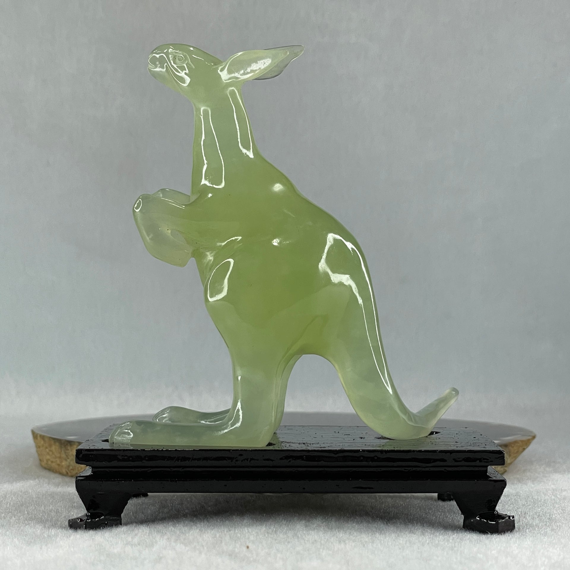 Natural Green Serpentine Kangaroo with Wooden Stand Display 172.6g 100.8 by 63.0 by 115.0mm - Huangs Jadeite and Jewelry Pte Ltd