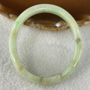 Type A Green with Brown Patches Jadeite Oval Bangle 31.51g Internal Diameter 55.6mm 10.3 by 6.6mm (External Roughs and Internal Lines) - Huangs Jadeite and Jewelry Pte Ltd