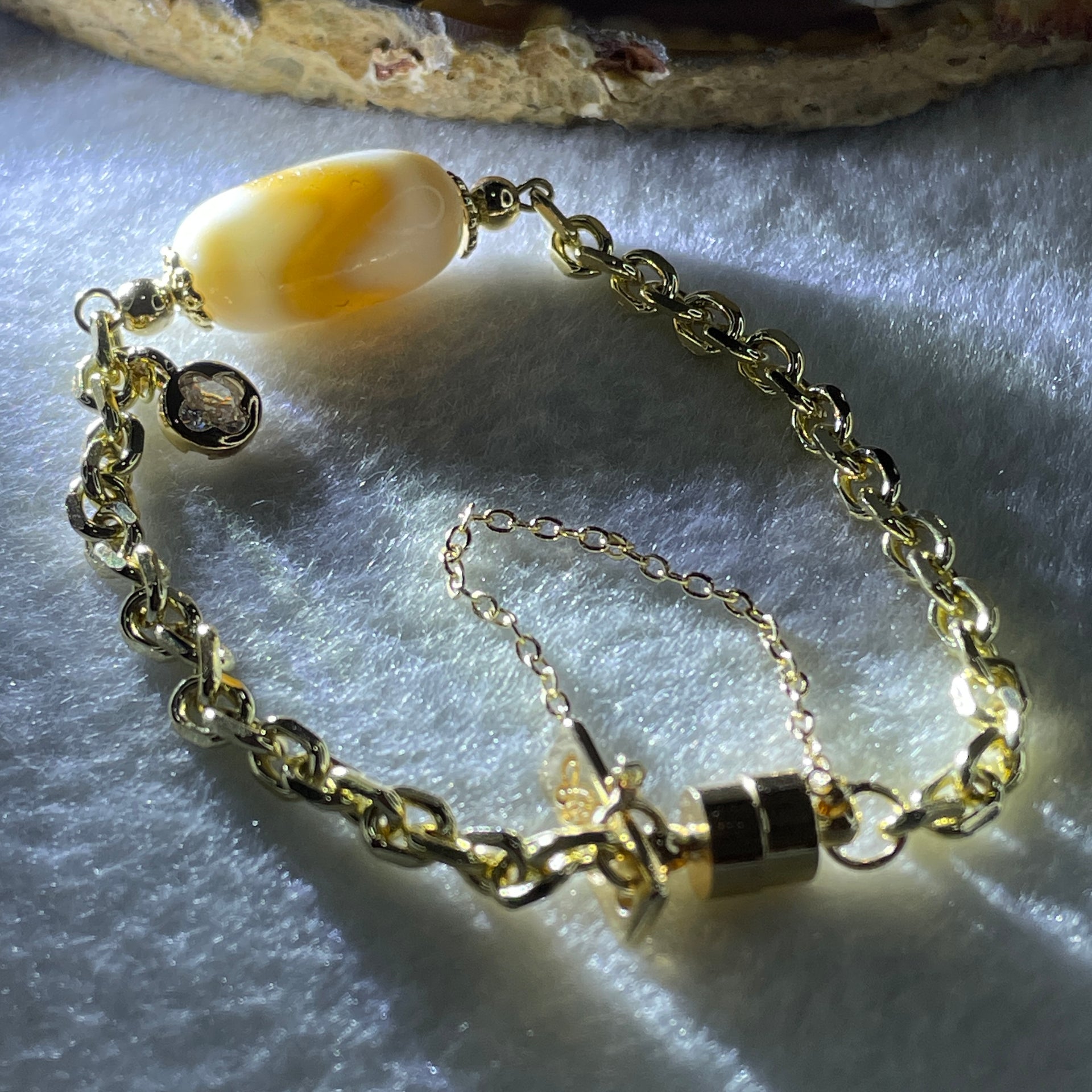 Natural Powerful Tibetan Old Oily Agate Tiger Tooth Daluo Dzi Bead with Stainless Steel Gold Color Bracelet 10.37g 16cm 19.1 by 10.1mm - Huangs Jadeite and Jewelry Pte Ltd