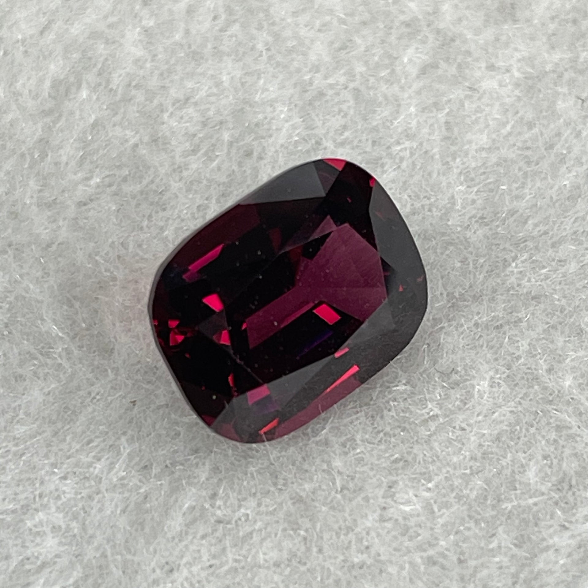 Natural Red Rhodolite Garnet Stone for Setting Cushion, brilliant/step cut 4.38cts 10.69 by 8.25 by 3.53mm NGI Cert No:32887346 - Huangs Jadeite and Jewelry Pte Ltd