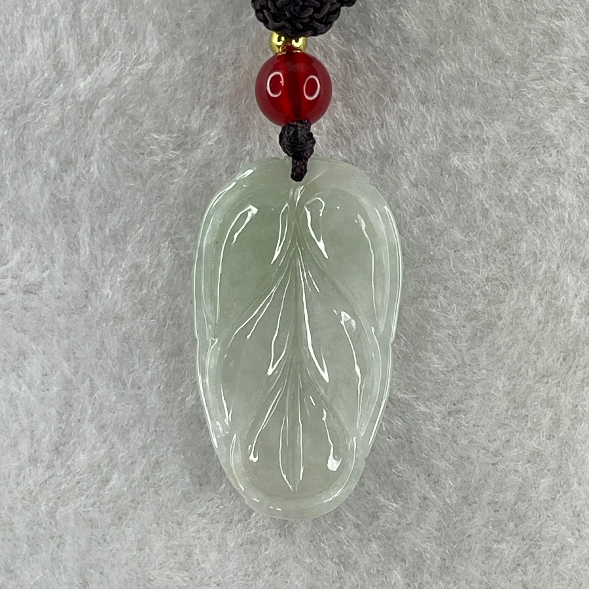 Natural Type A Faint Green Jadeite Leaf Pendant 4.77g 24.8 by 16.4 by 4.0mm - Huangs Jadeite and Jewelry Pte Ltd