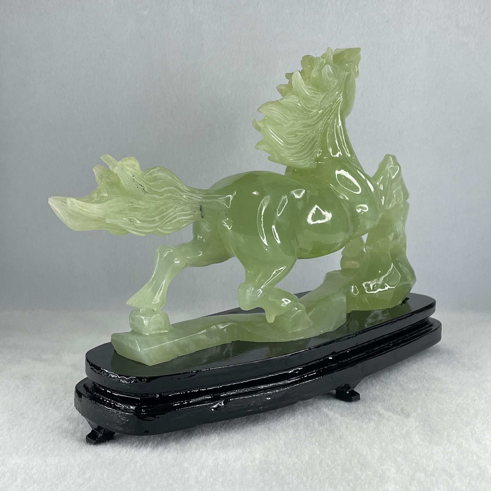 Natural Light Green Serpentine Victory Horse with Wooden Stand Display 1,274.6g 255.0 by 90.0 by 183.0mm - Huangs Jadeite and Jewelry Pte Ltd