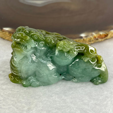 Grand Master Type A Brown with Blueish Green Jadeite Pixiu with Baby 123.56g 63.4 by 34.3 by 37.8mm - Huangs Jadeite and Jewelry Pte Ltd