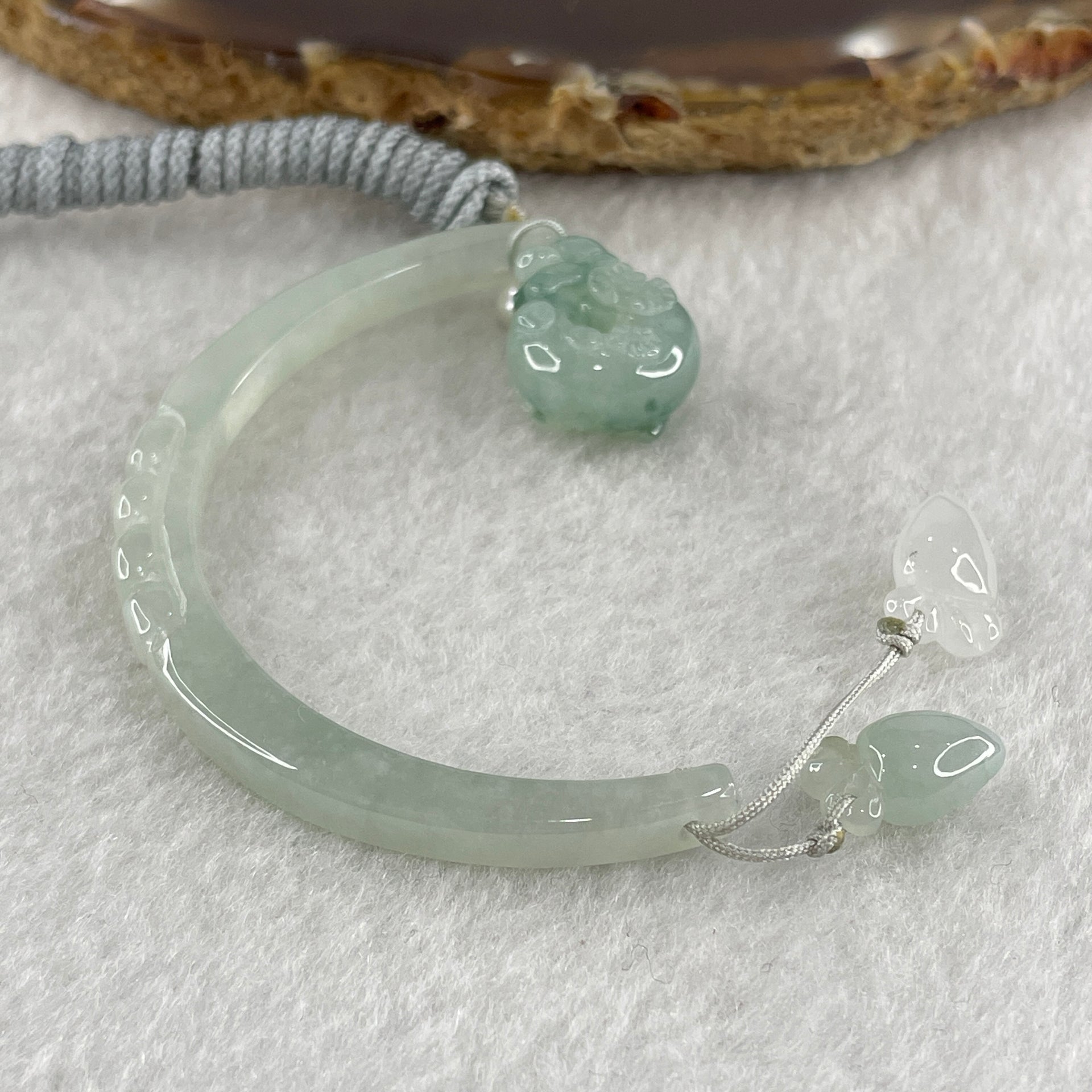 Natural Type A Semi Icy Light Green Jadeite Moon with Rabbit and Flower on Ping An Kou and Carrot Necklace 11.72g 17.2 by 13.6 by 8.6mm Ping An Kou - 56.7 by 4.4 by 5.5mm Moon - Huangs Jadeite and Jewelry Pte Ltd