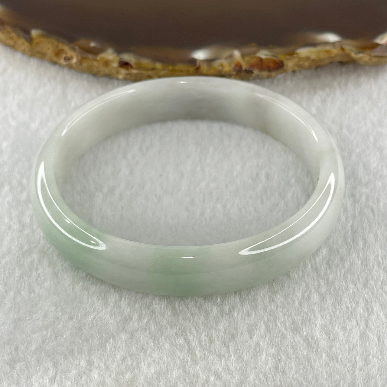 Natural Type A Faint Green Faint Lavender Jadeite Oval Bangle 33.20g Inner Diameter 54.9mm 11.7 by 6.3mm (Very Very Slight Internal Lines) - Huangs Jadeite and Jewelry Pte Ltd