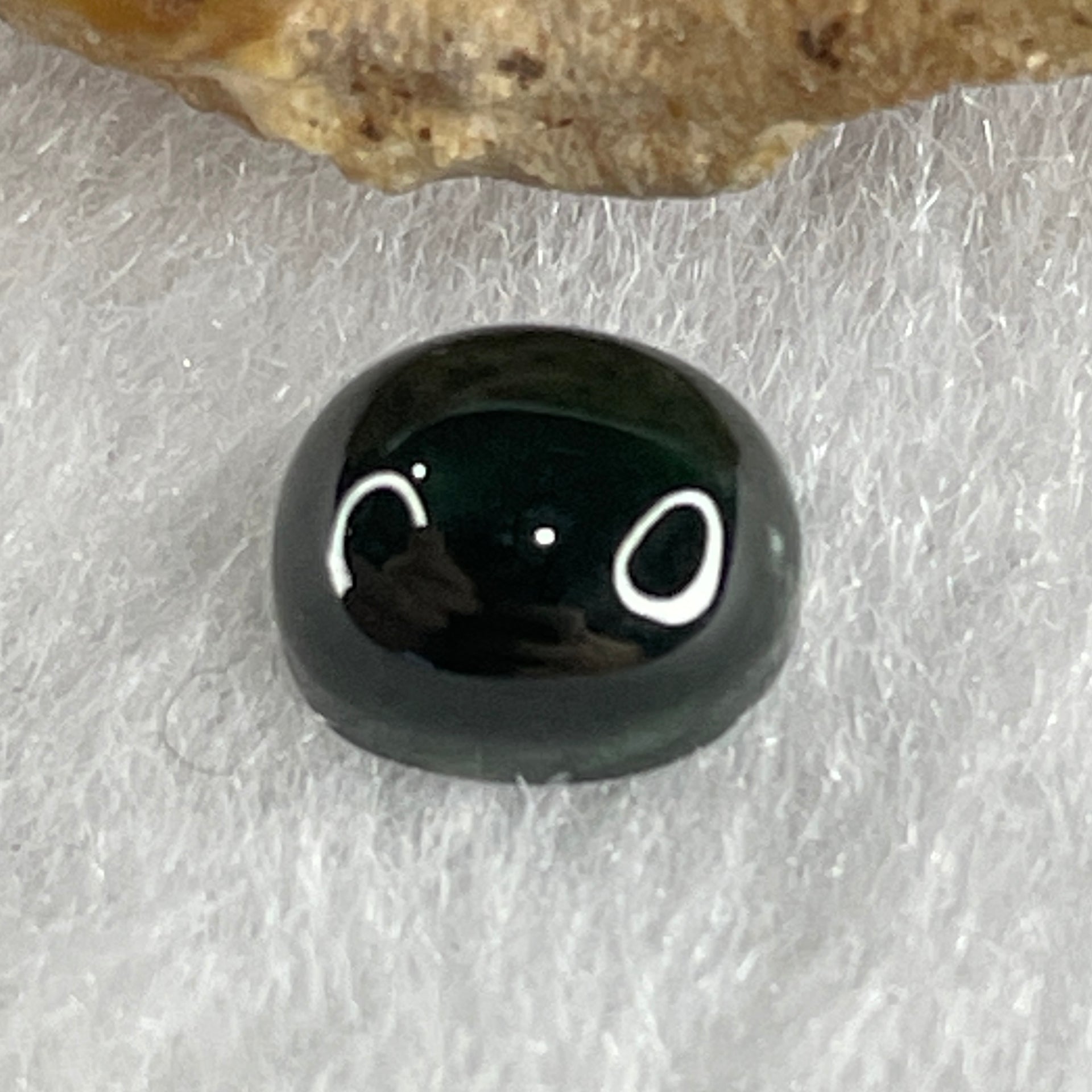 Type A Translucent Black Omphacite Jadeite Oval Cabouchon Stone For Setting 0.38g 7.3 by 6.1 by 4.0mm - Huangs Jadeite and Jewelry Pte Ltd
