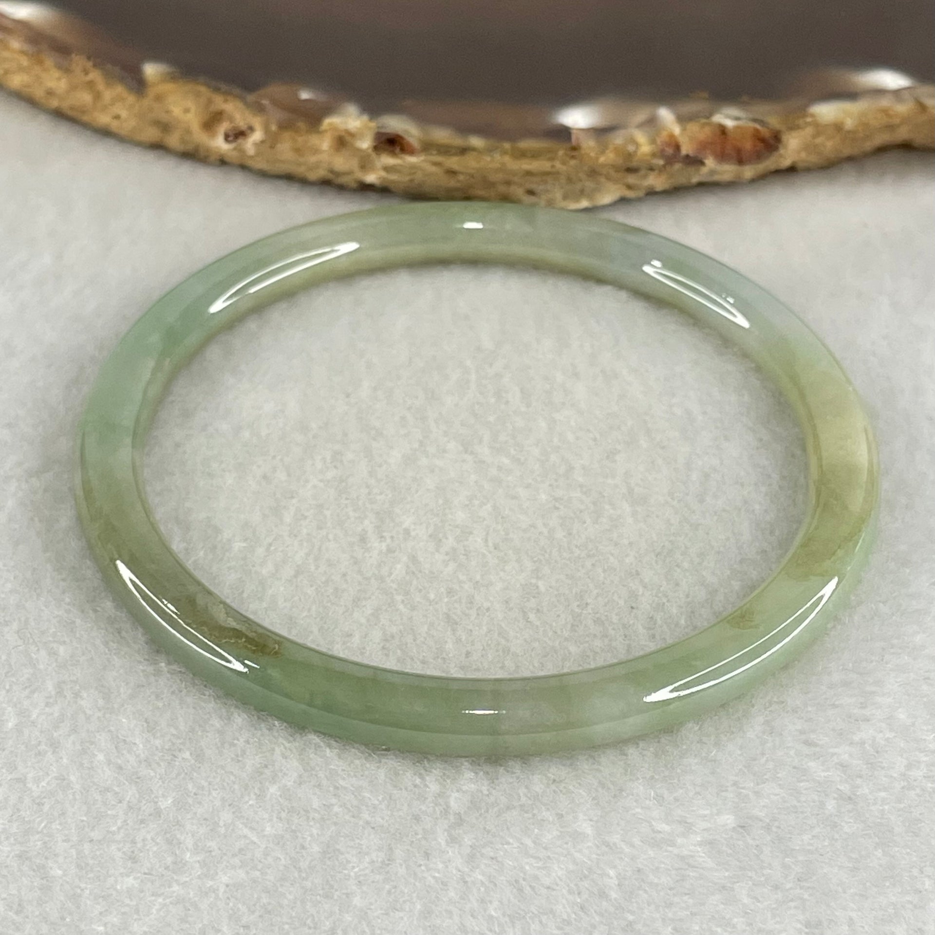 Type A Green Jadeite Bangle 17.07g Inner Diameter 57.4mm 5.1 by 6.4mm (Internal Lines) - Huangs Jadeite and Jewelry Pte Ltd