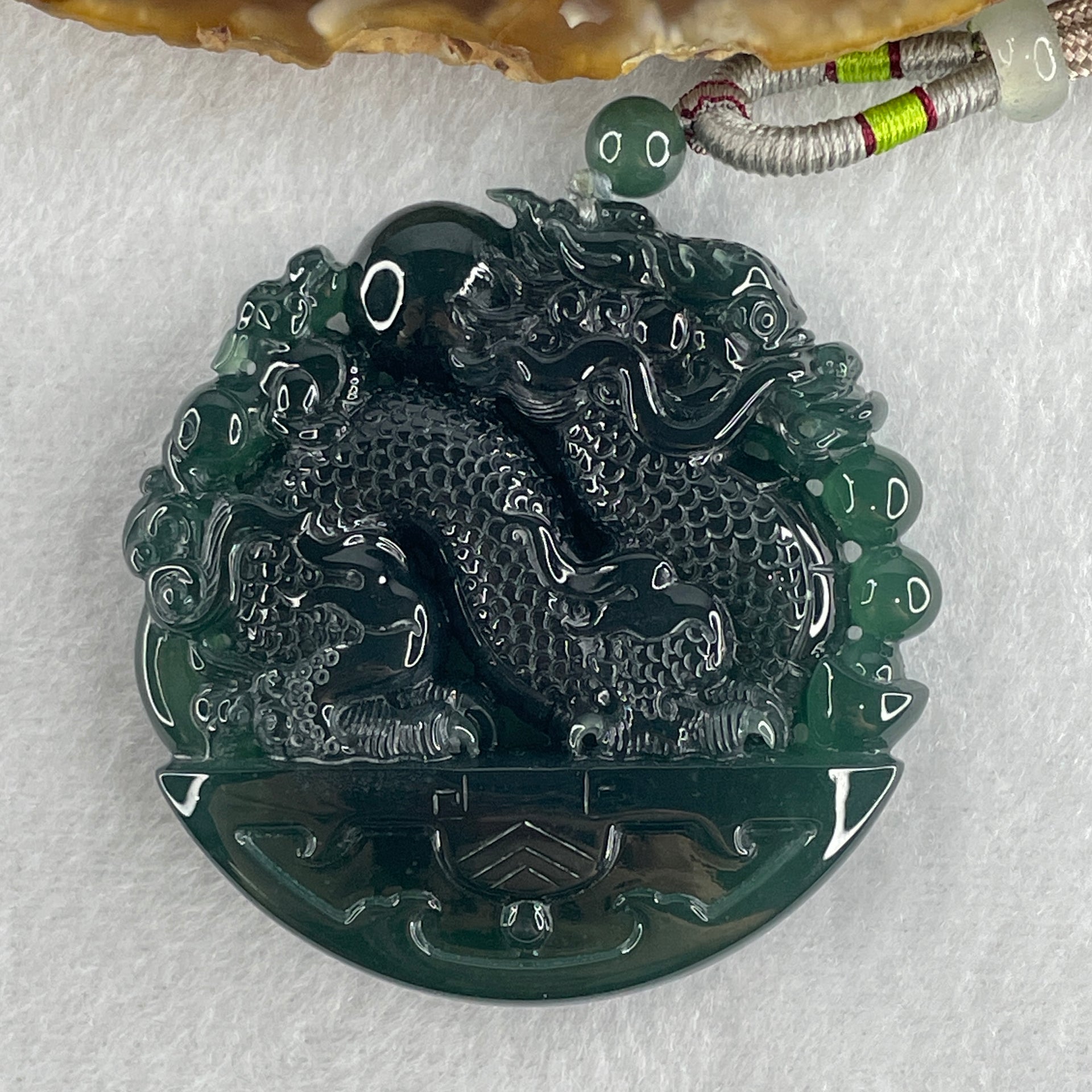 Type A Semi Icy Blueish Green Jadeite Double Dragon Pendant 71.30g 54.0 by 11.9mm - Huangs Jadeite and Jewelry Pte Ltd