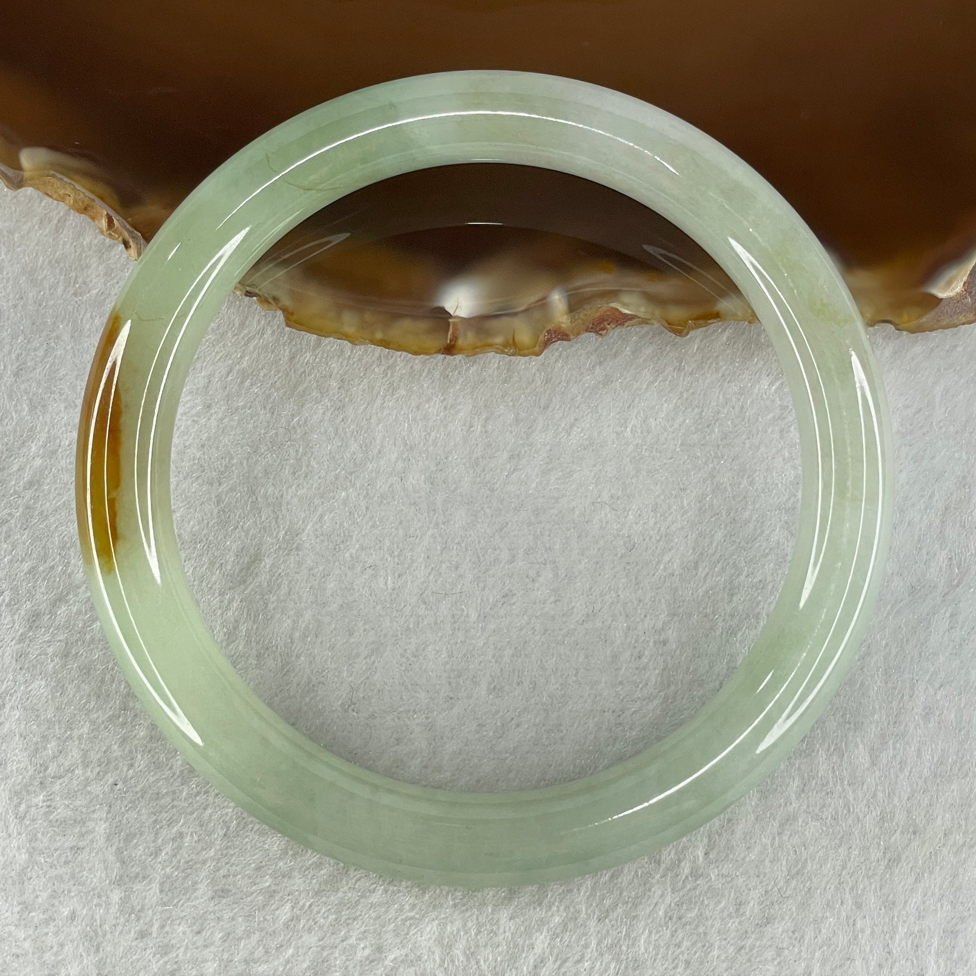 Natural Type A Light Green with Yellow Brown Patch Jadeite Bangle 38.72g Inner Diameter 56.5mm Thickness 8.7 by 8.6mm (Internal Lines) - Huangs Jadeite and Jewelry Pte Ltd