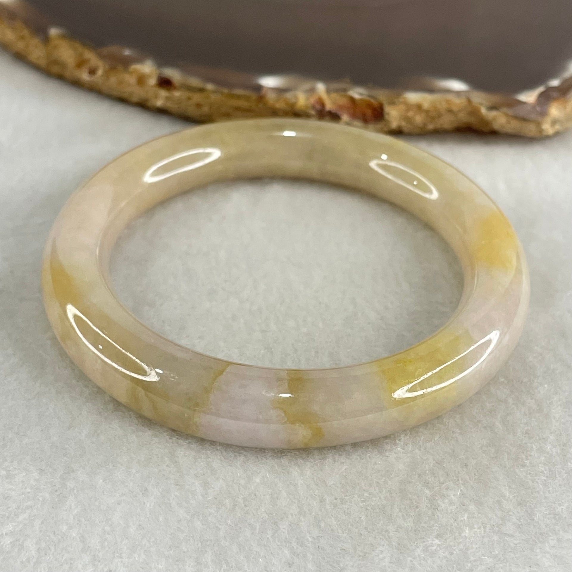 Type A Yellowish Brown and Lavender Jadeite Bangle 52.62g Internal Diameter 52.1mm 10.4 by 9.8mm (Very Slight Internal Lines and external Rough, Burnt) - Huangs Jadeite and Jewelry Pte Ltd