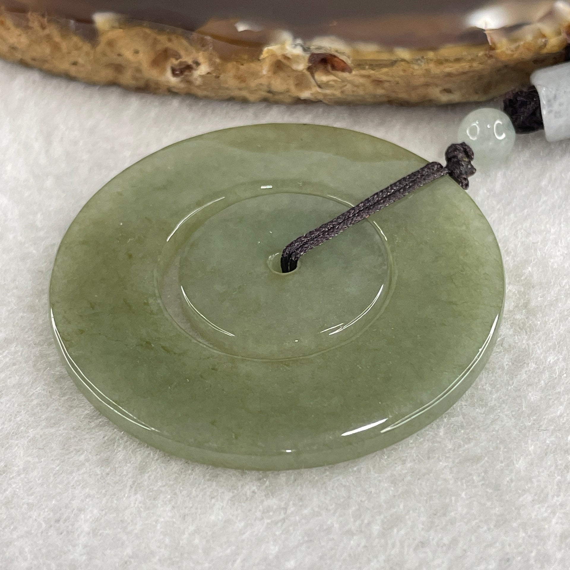 Natural Type A Green with Brownish Jadeite Double Ping An Kou Donut Pendant 20.64g 44.9 by 3.4mm - Huangs Jadeite and Jewelry Pte Ltd